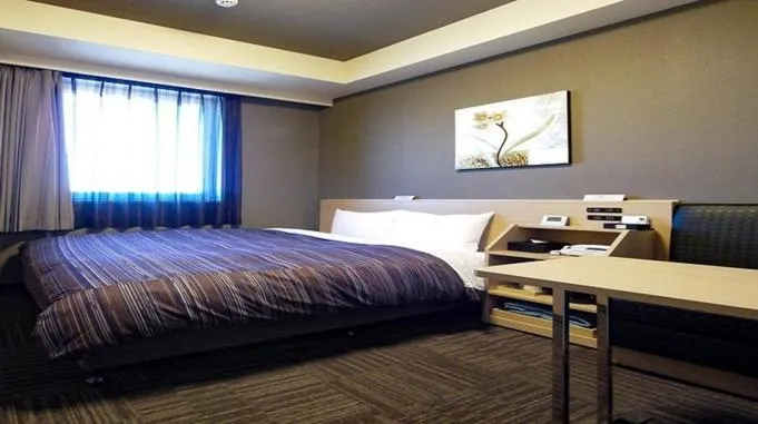 Bed in Hotel Route-Inn Shimizu Inter