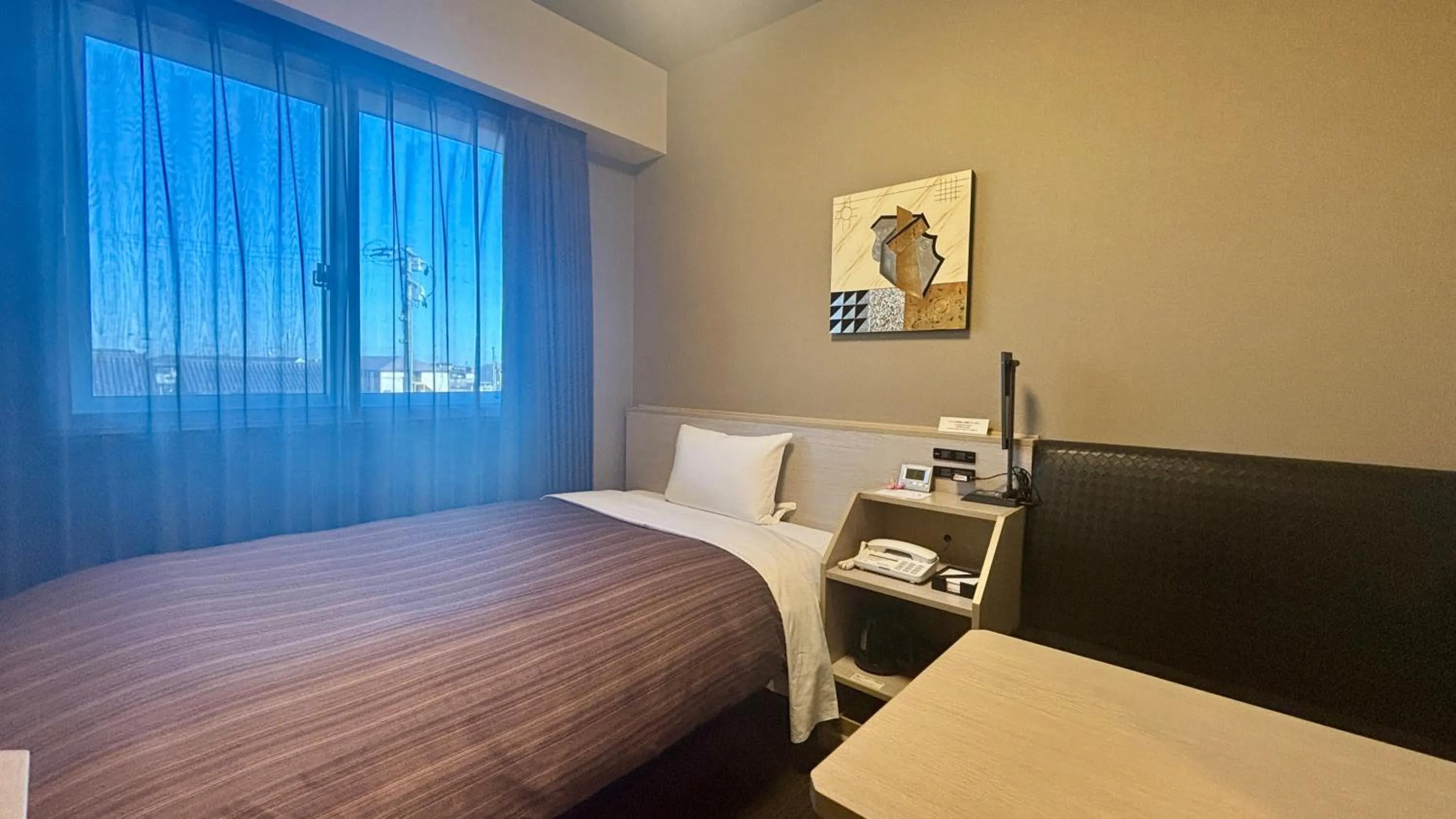 Bed in Hotel Route-Inn Natori Iwanuma Inter -Sendai Kuko-