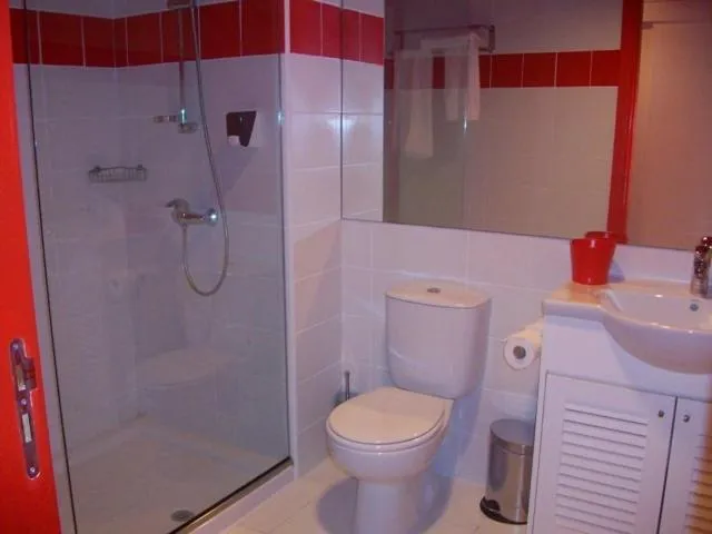 Bathroom in Allegra GSP Sport Center