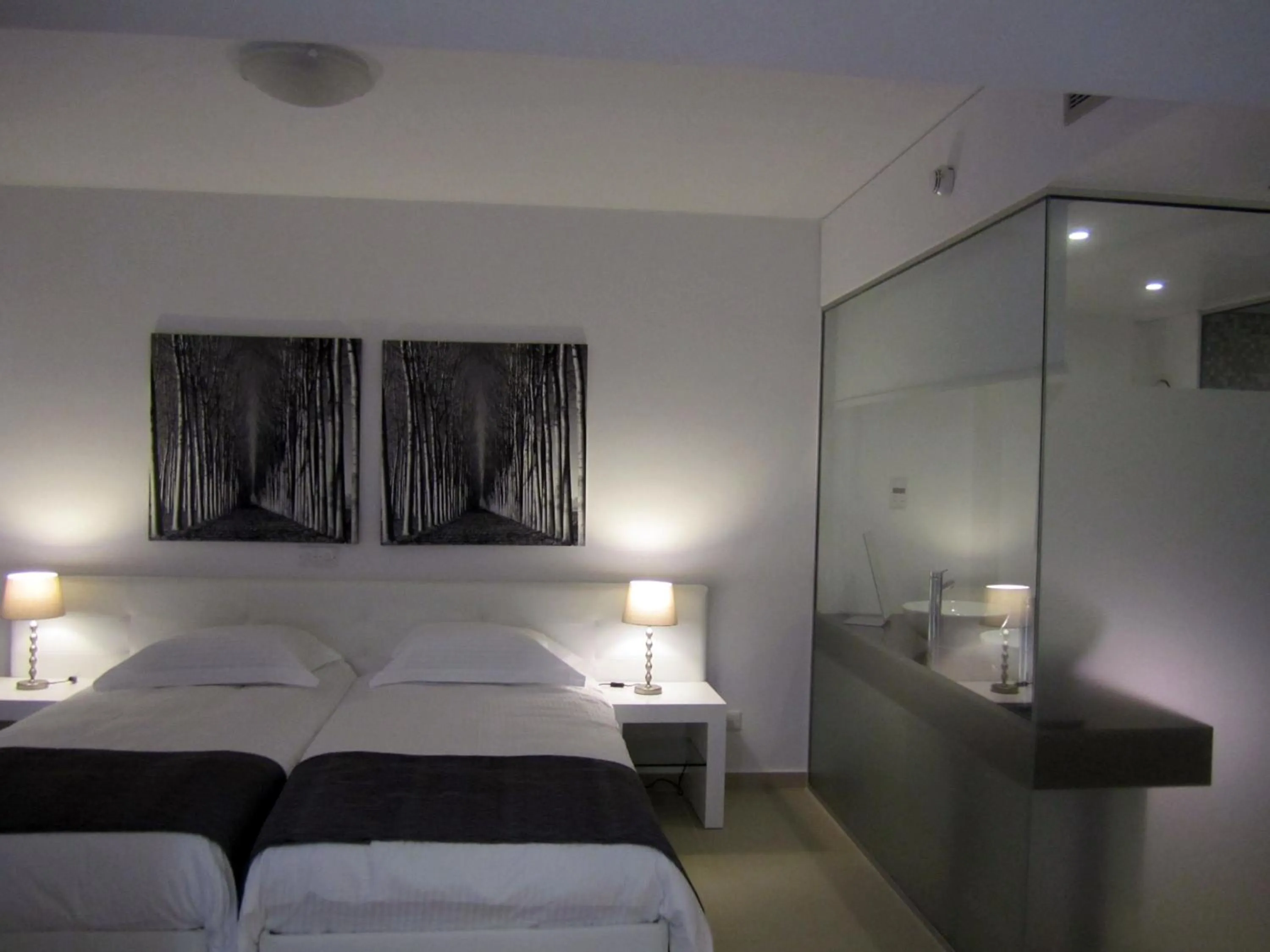 Bed in Alva Hotel Apartments