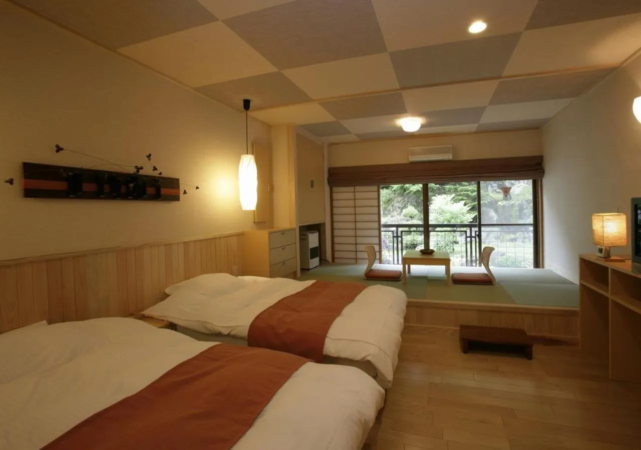 Photo of the whole room, Bed in Hishino Onsen Tokiwakan