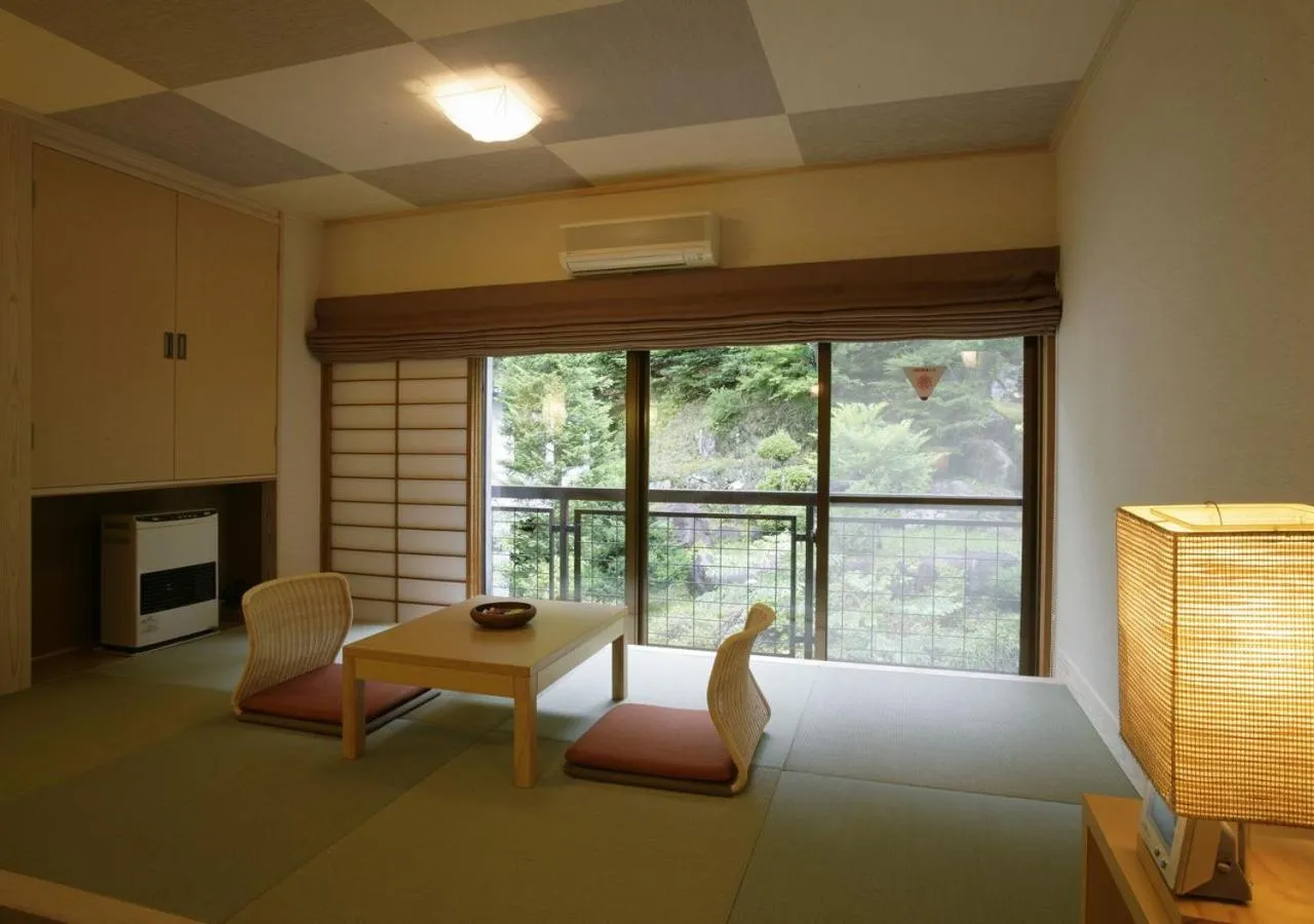 Photo of the whole room, Bed in Hishino Onsen Tokiwakan