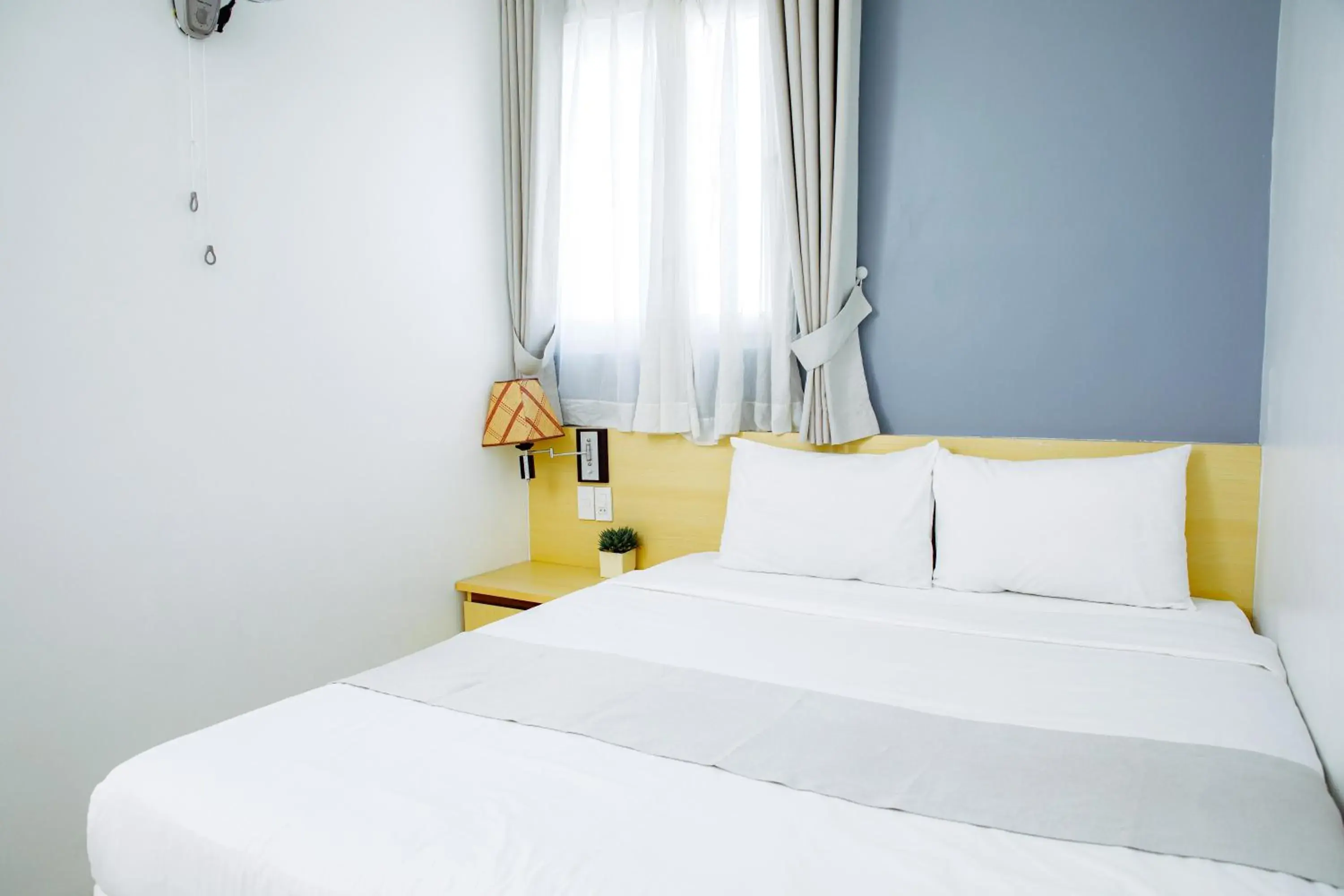 Bed in Ngoc Nguyen Anh Hotel Da Lat Bed in Ngoc Nguyen Anh Hotel Da Lat