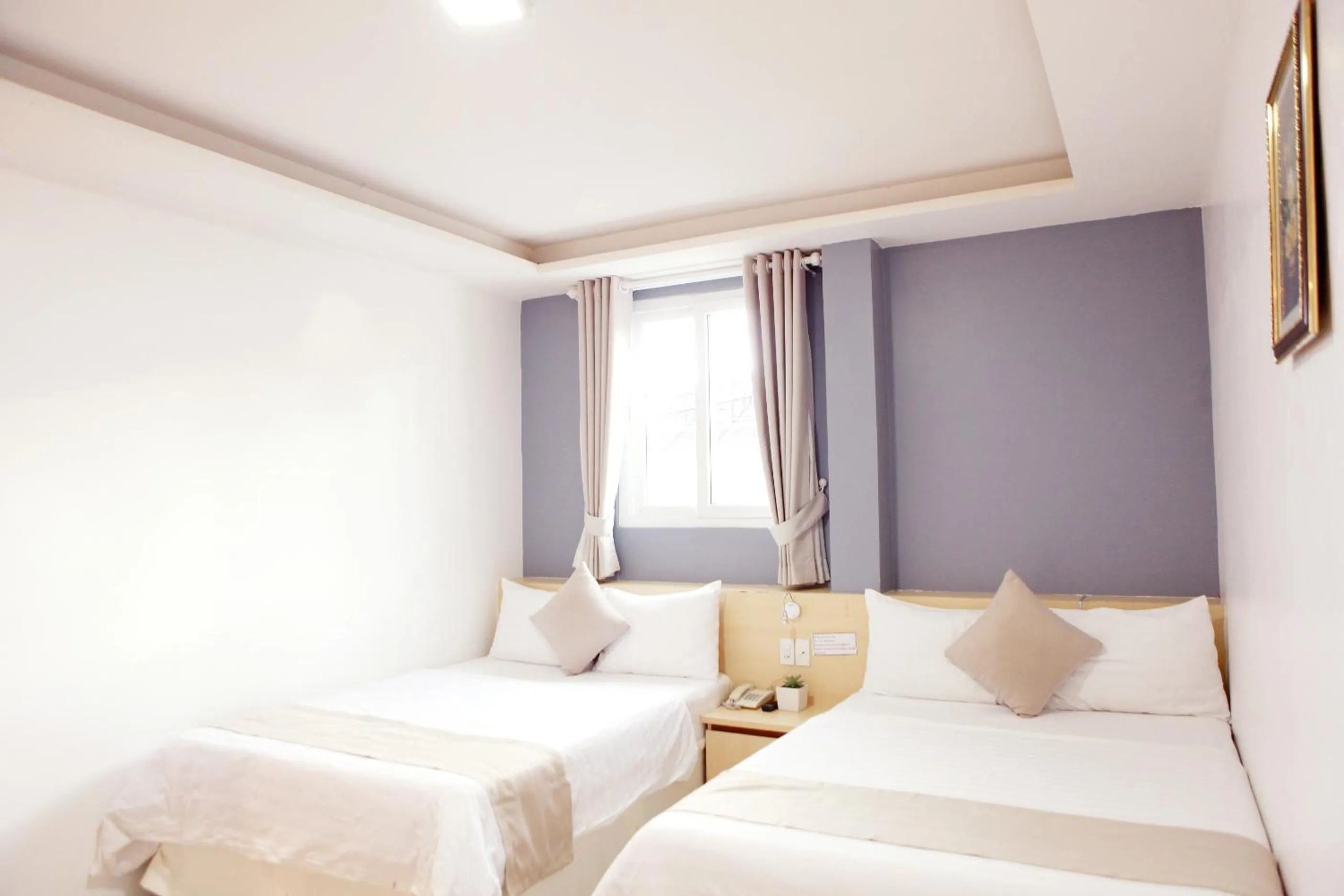 Bed in Ngoc Nguyen Anh Hotel Da Lat