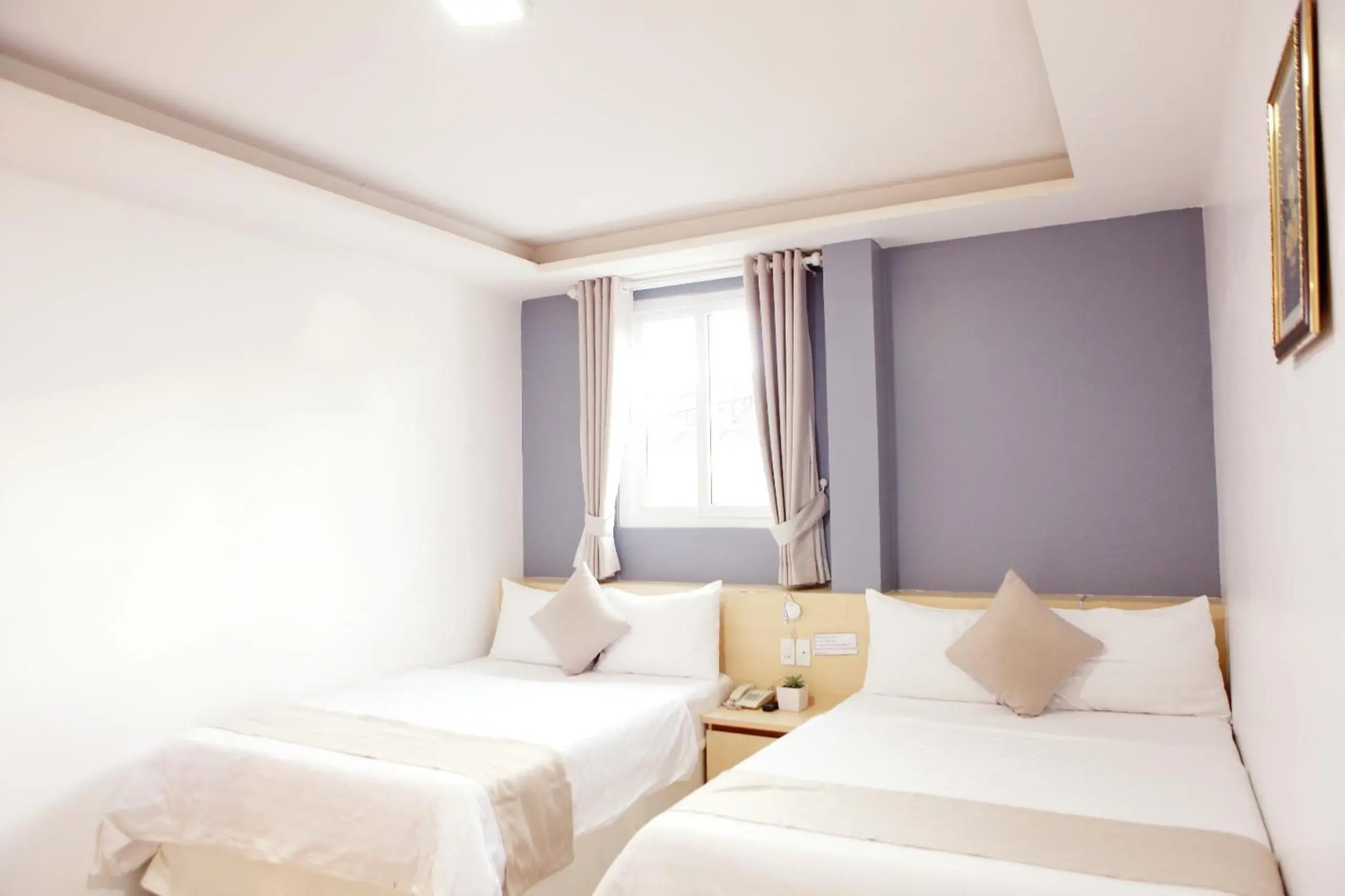 Bed in Ngoc Nguyen Anh Hotel Da Lat Bed in Ngoc Nguyen Anh Hotel Da Lat