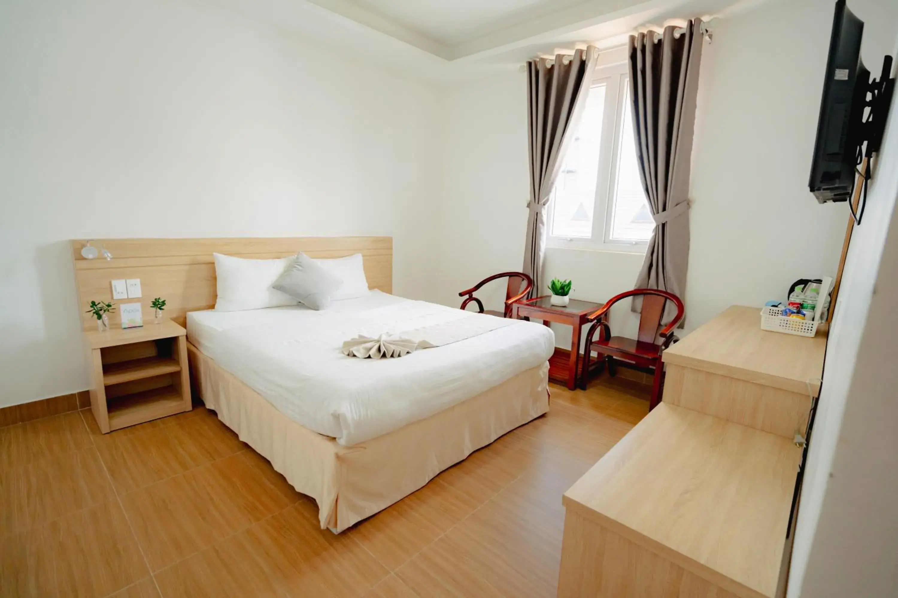 Bed in Ngoc Nguyen Anh Hotel Da Lat Bed in Ngoc Nguyen Anh Hotel Da Lat