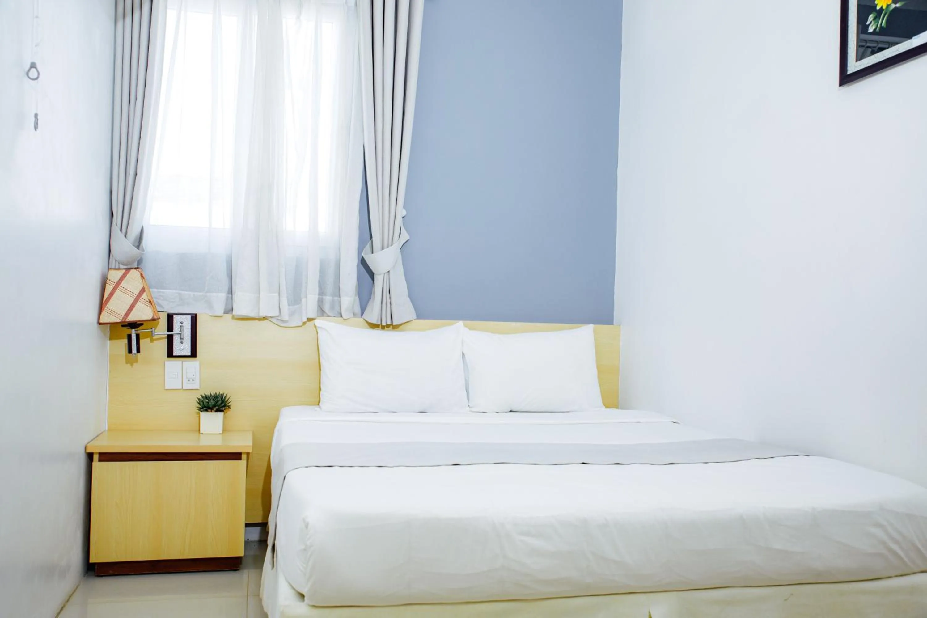 Bed in Ngoc Nguyen Anh Hotel Da Lat