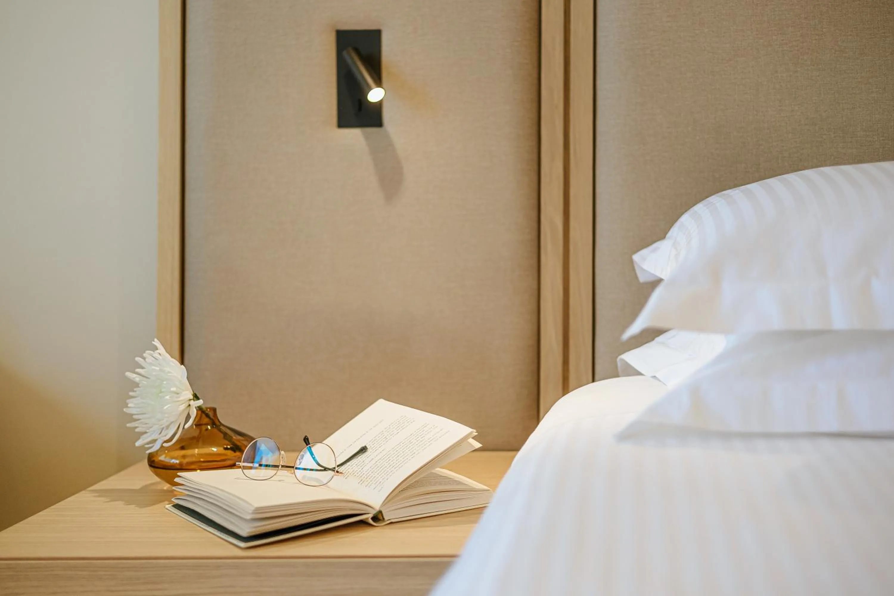 Bed in Alion Beach Hotel