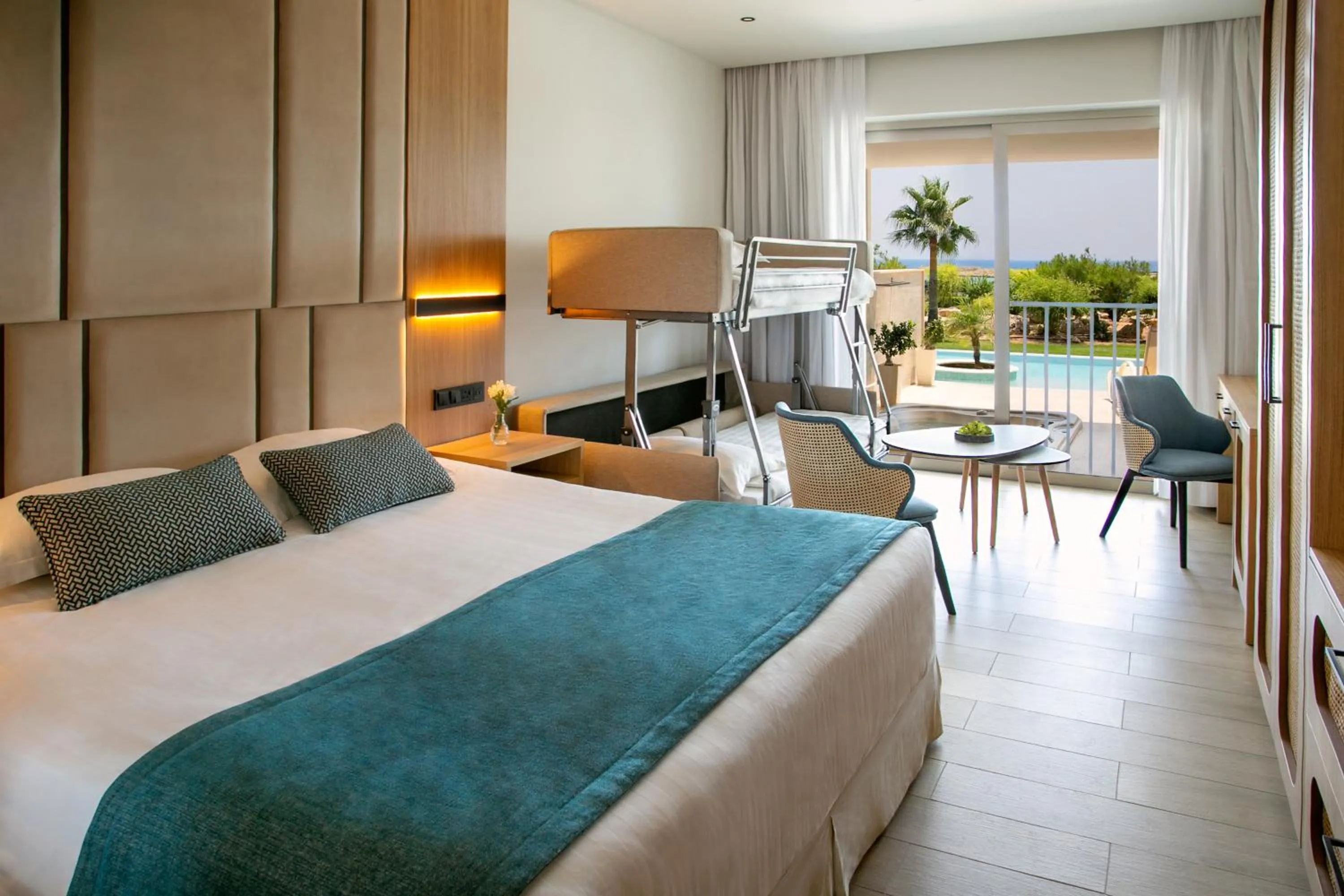 Bed in Asterias Beach Hotel