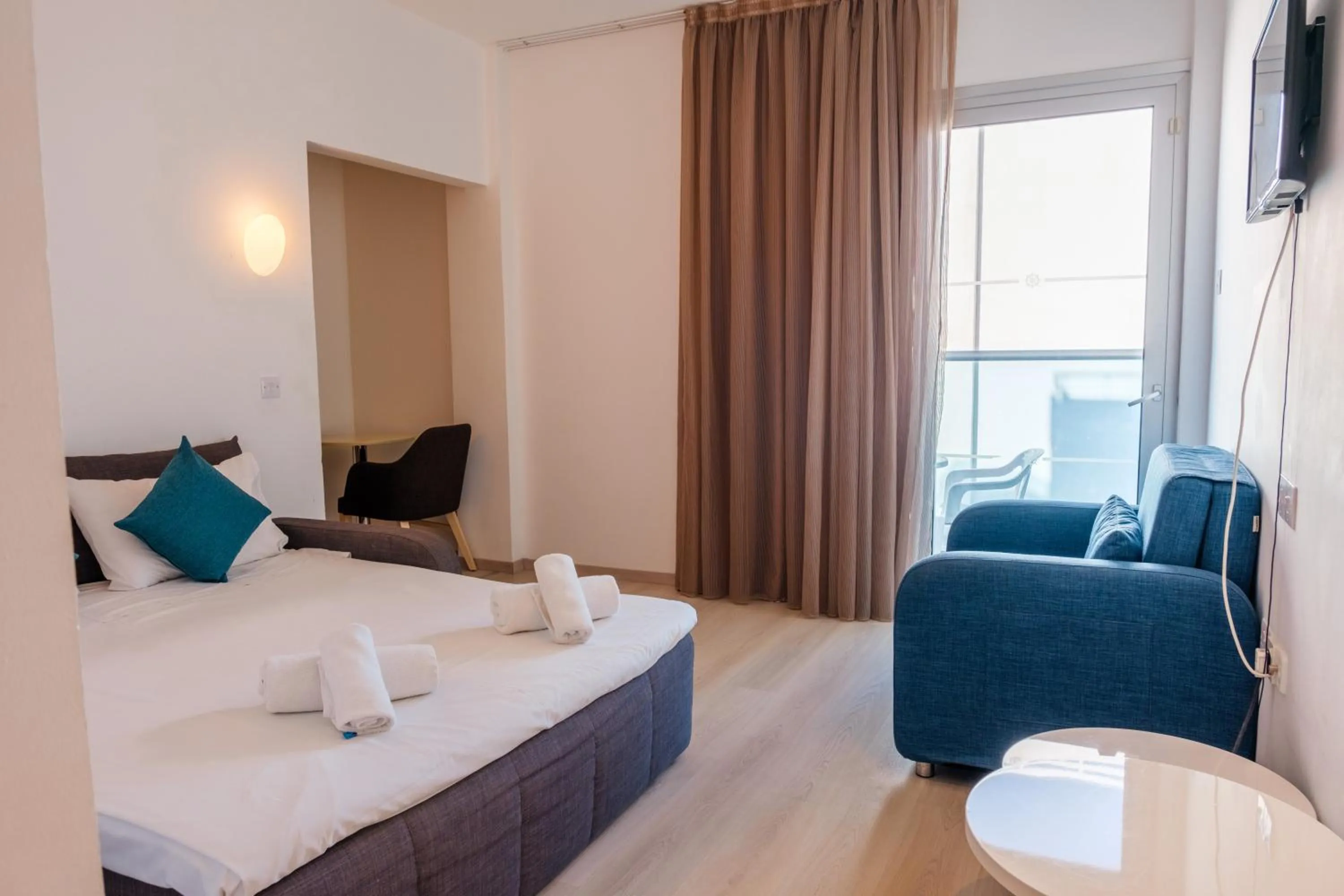 Bed in Kapetanios Bay Hotel Protaras