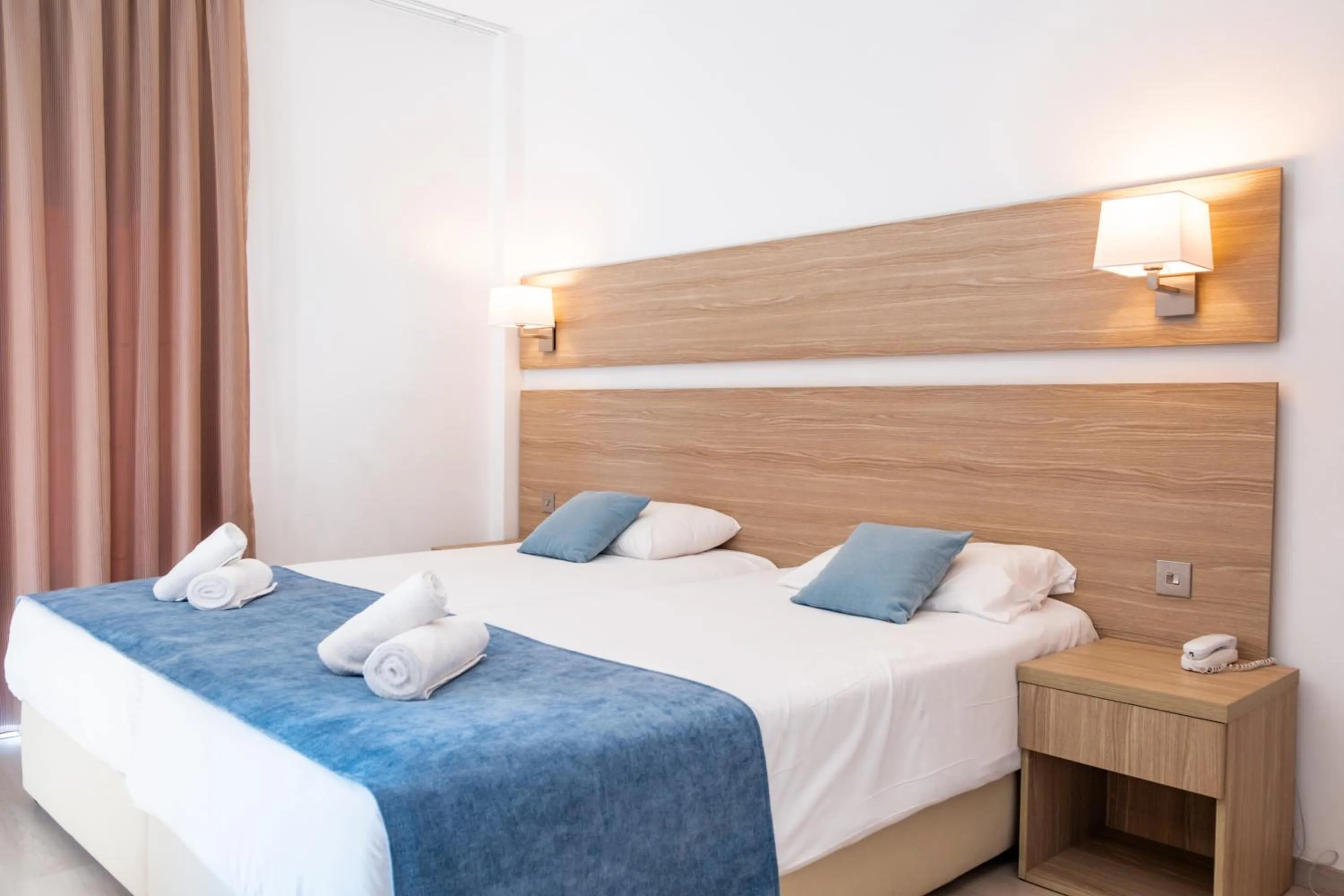 Bed in Kapetanios Bay Hotel Protaras