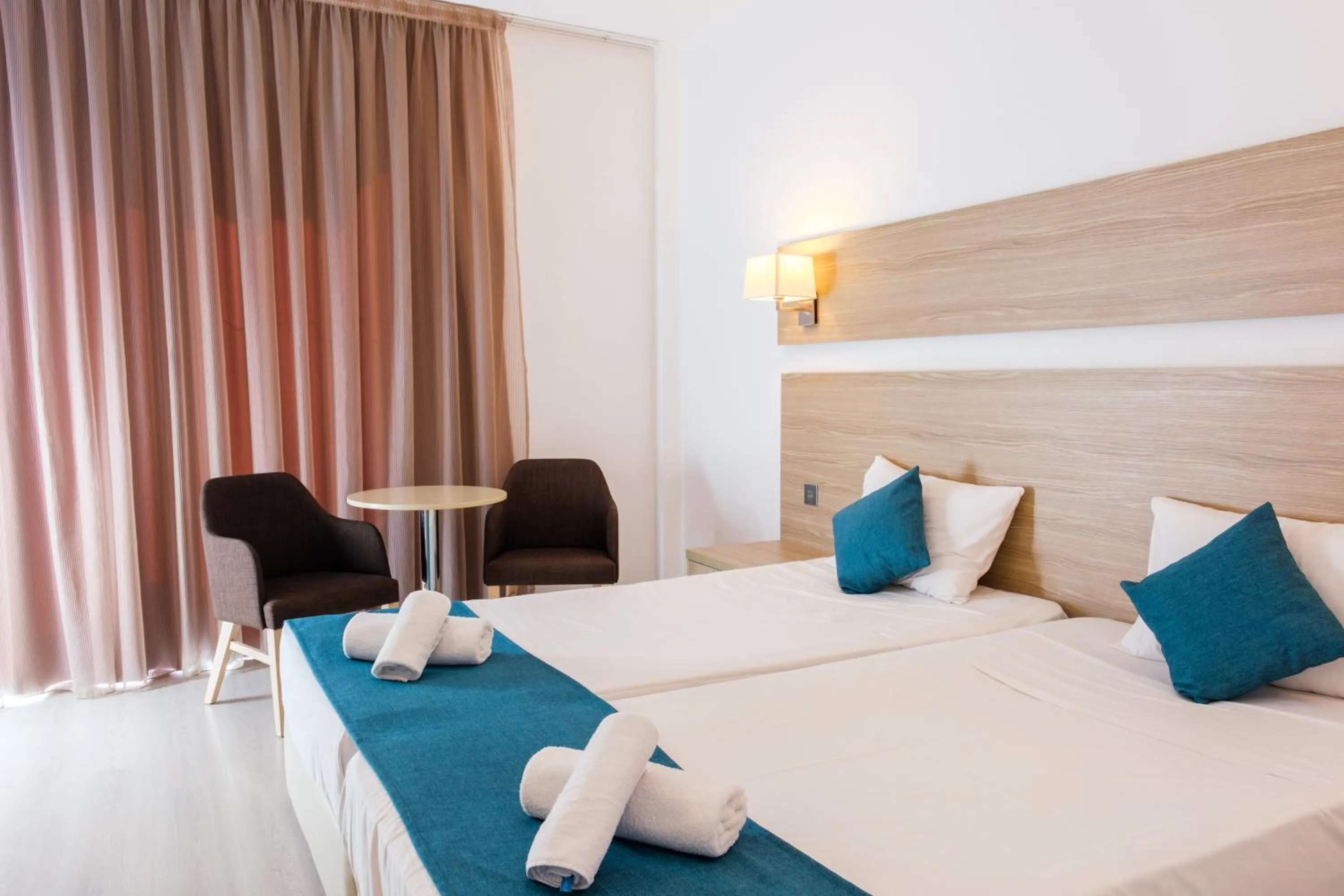 Bed in Kapetanios Bay Hotel Protaras