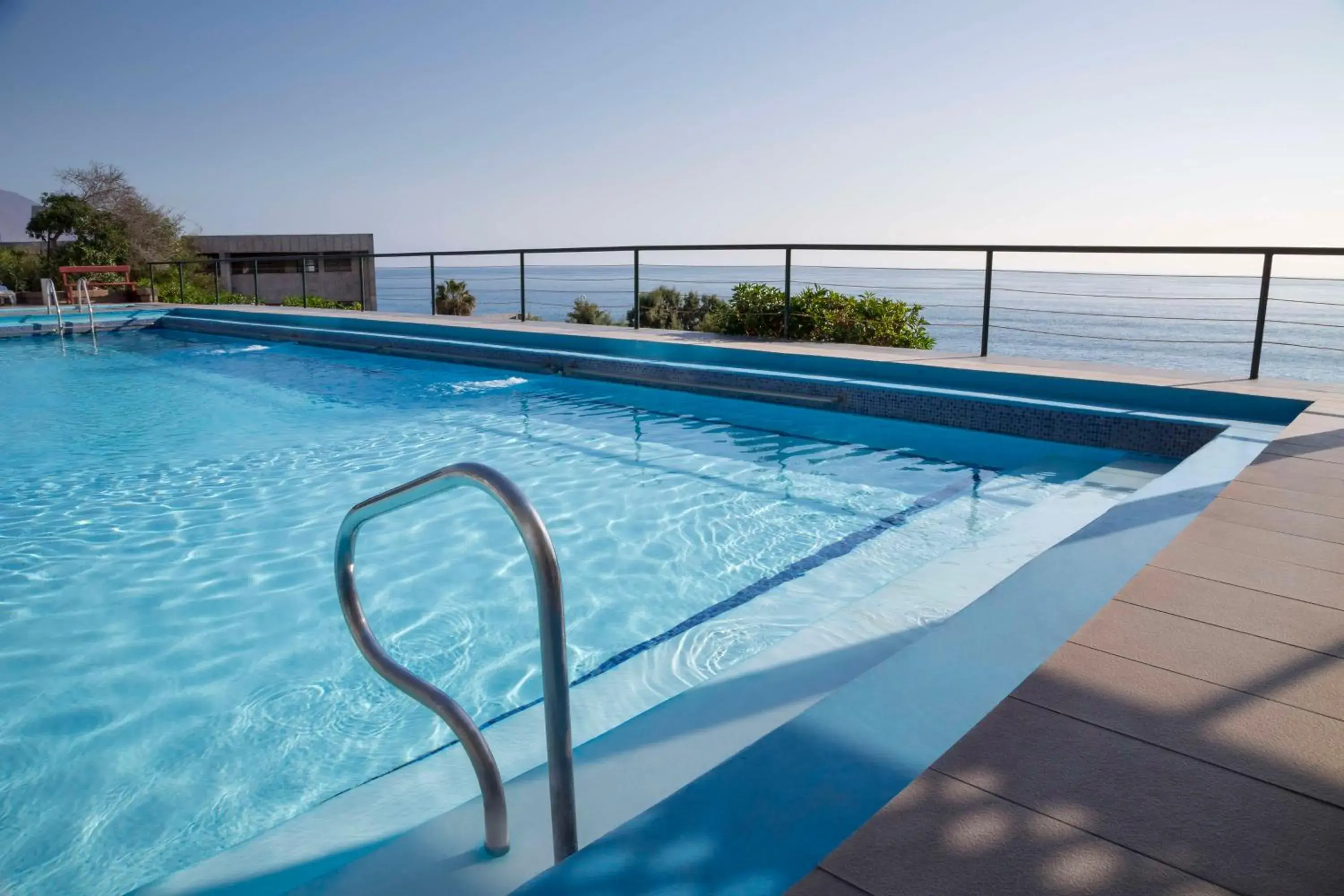 Pool view in NH Iquique Costa Pool view in NH Iquique Costa