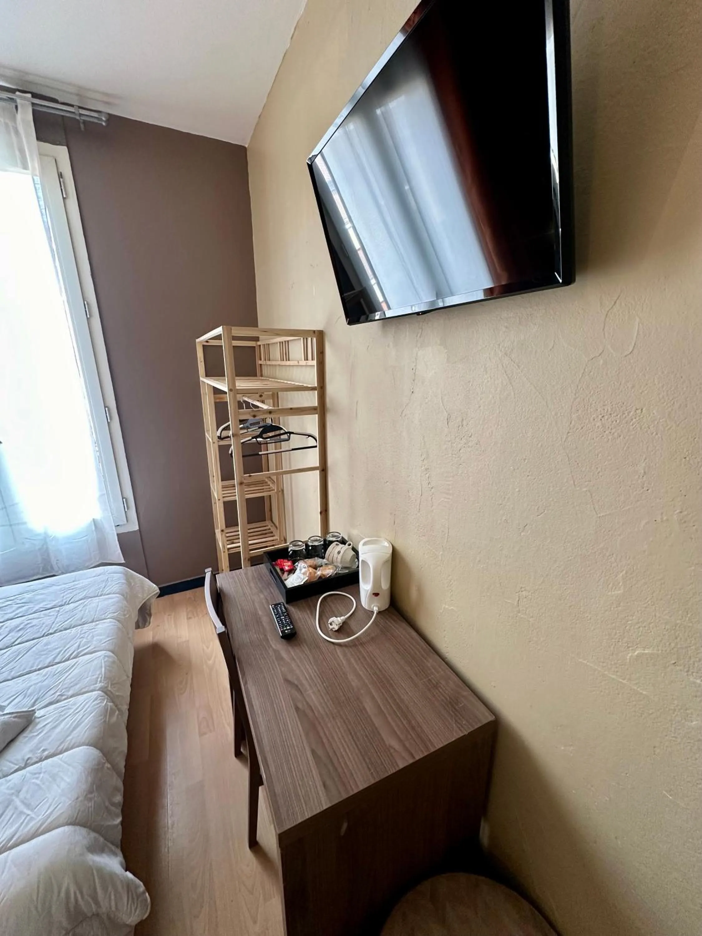 Bed in Hotel Victor Hugo