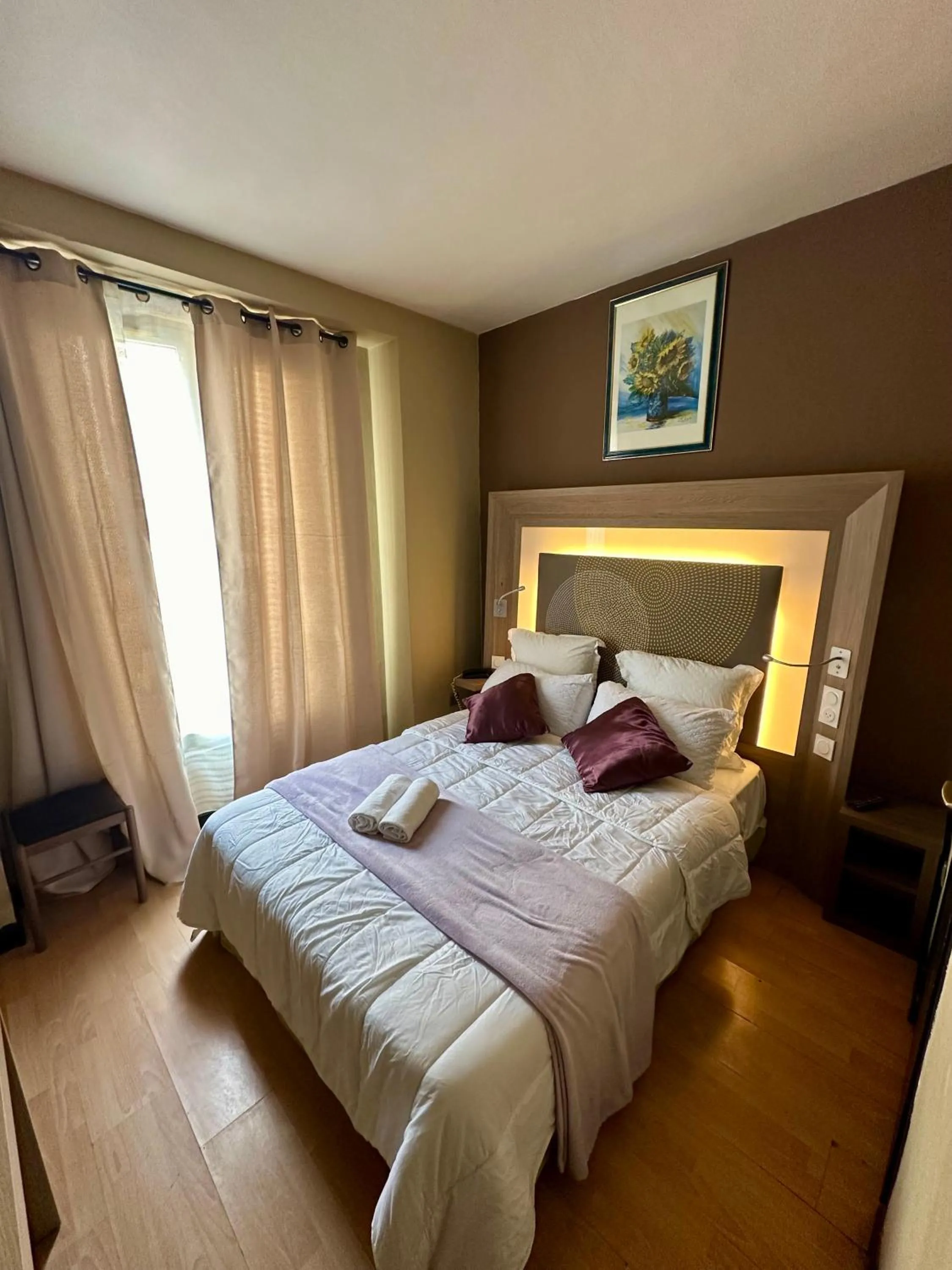 Bed in Hotel Victor Hugo