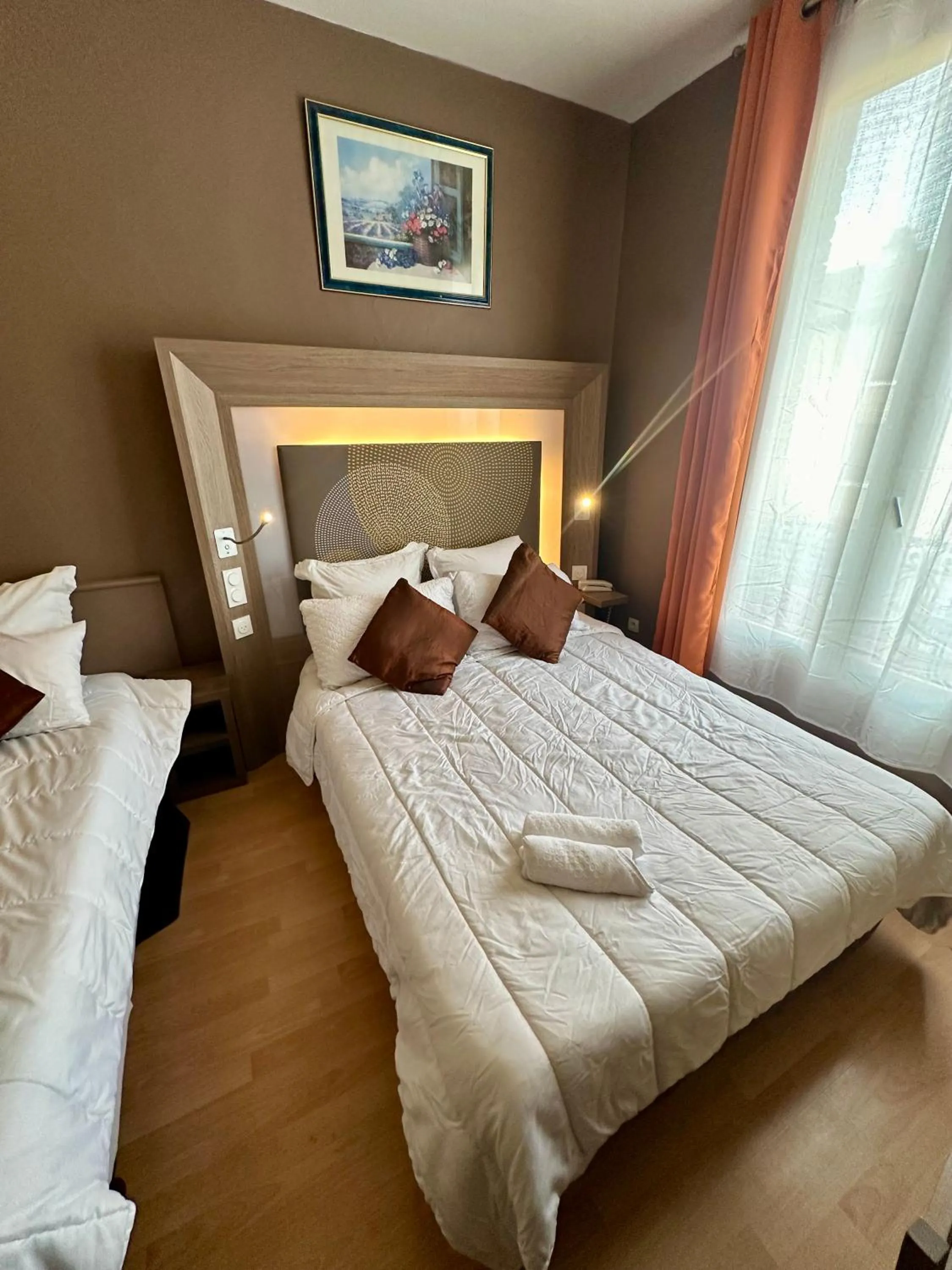 Bed in Hotel Victor Hugo