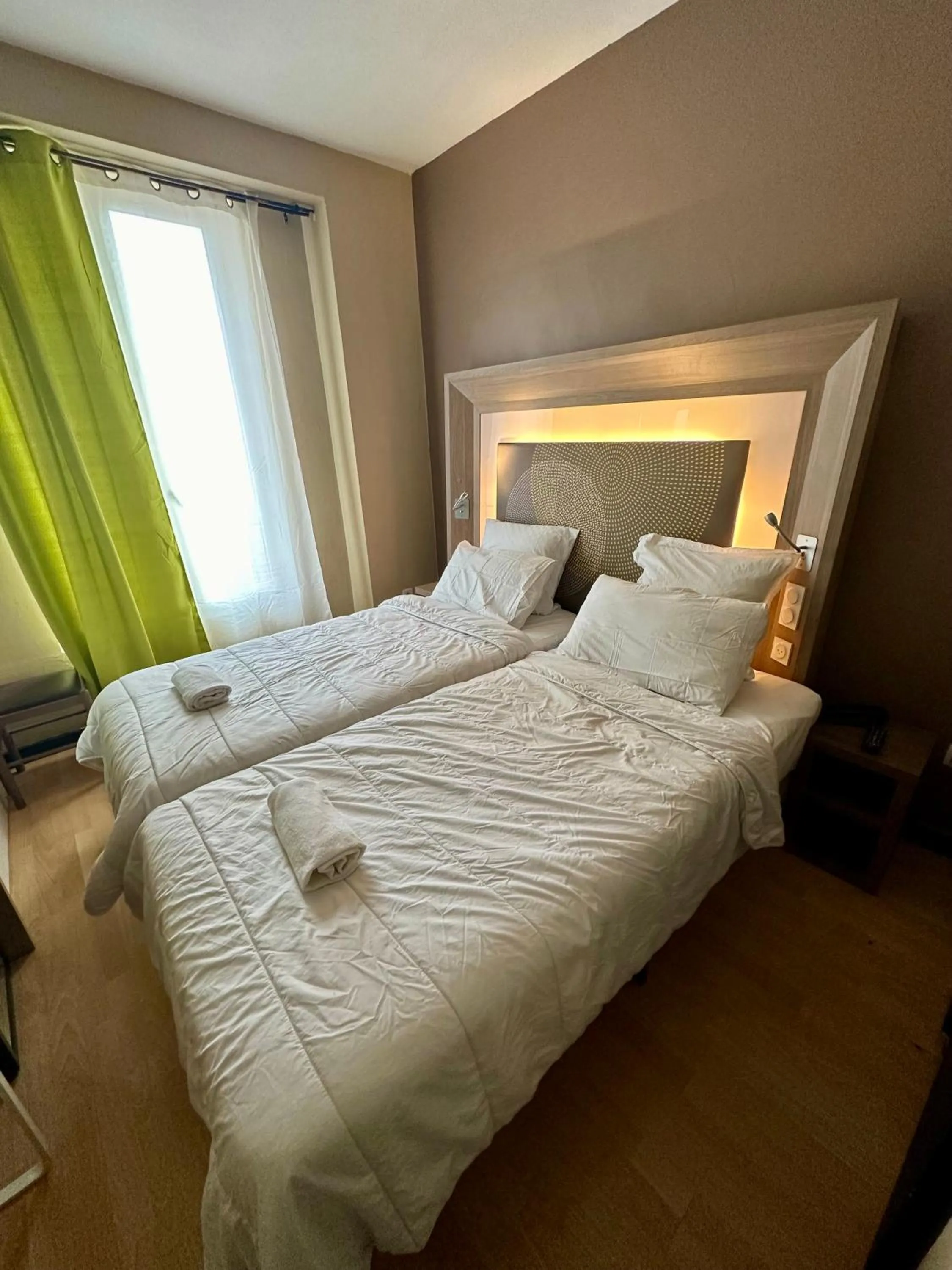 Bed in Hotel Victor Hugo