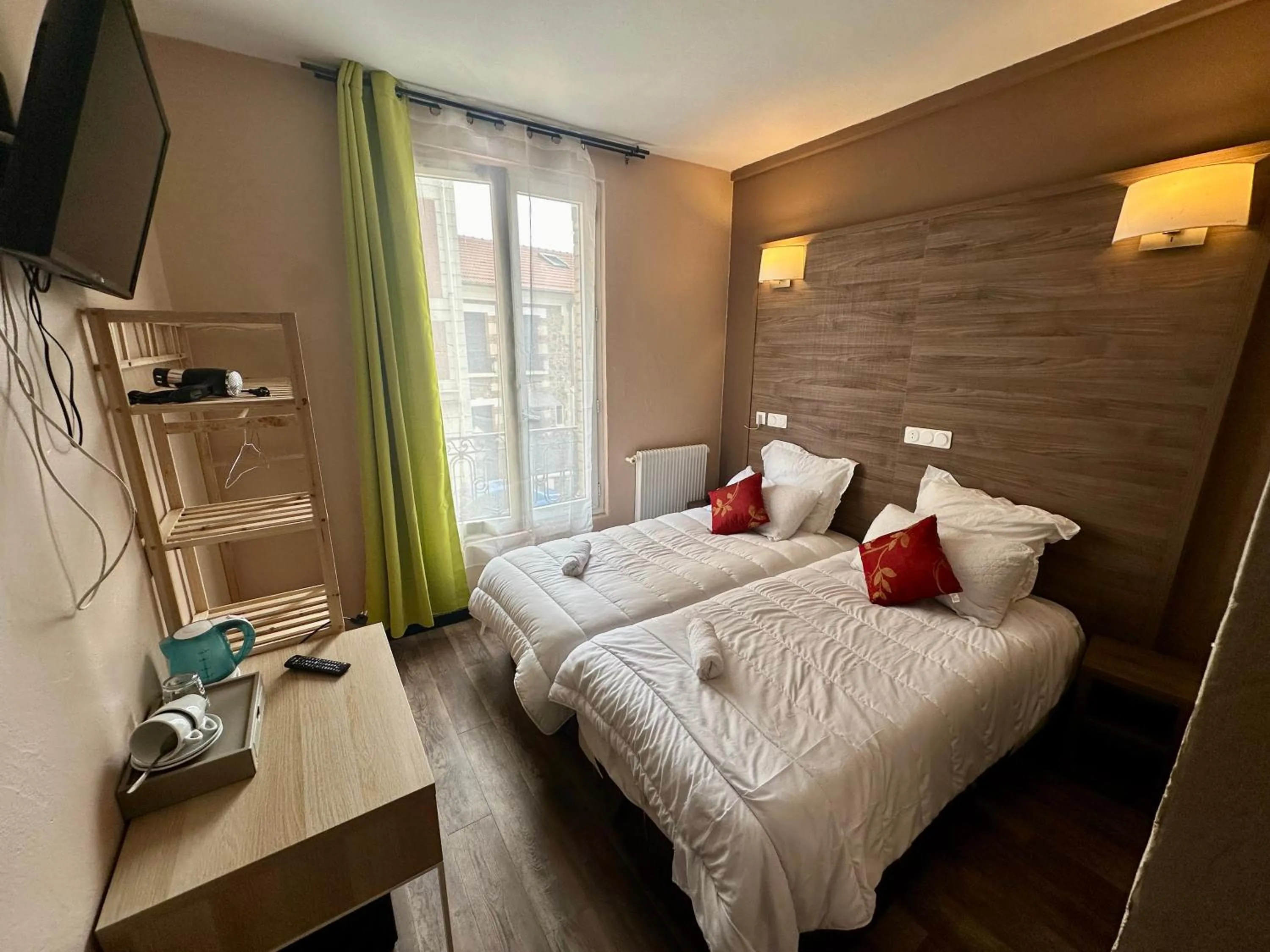 Bed in Hotel Victor Hugo