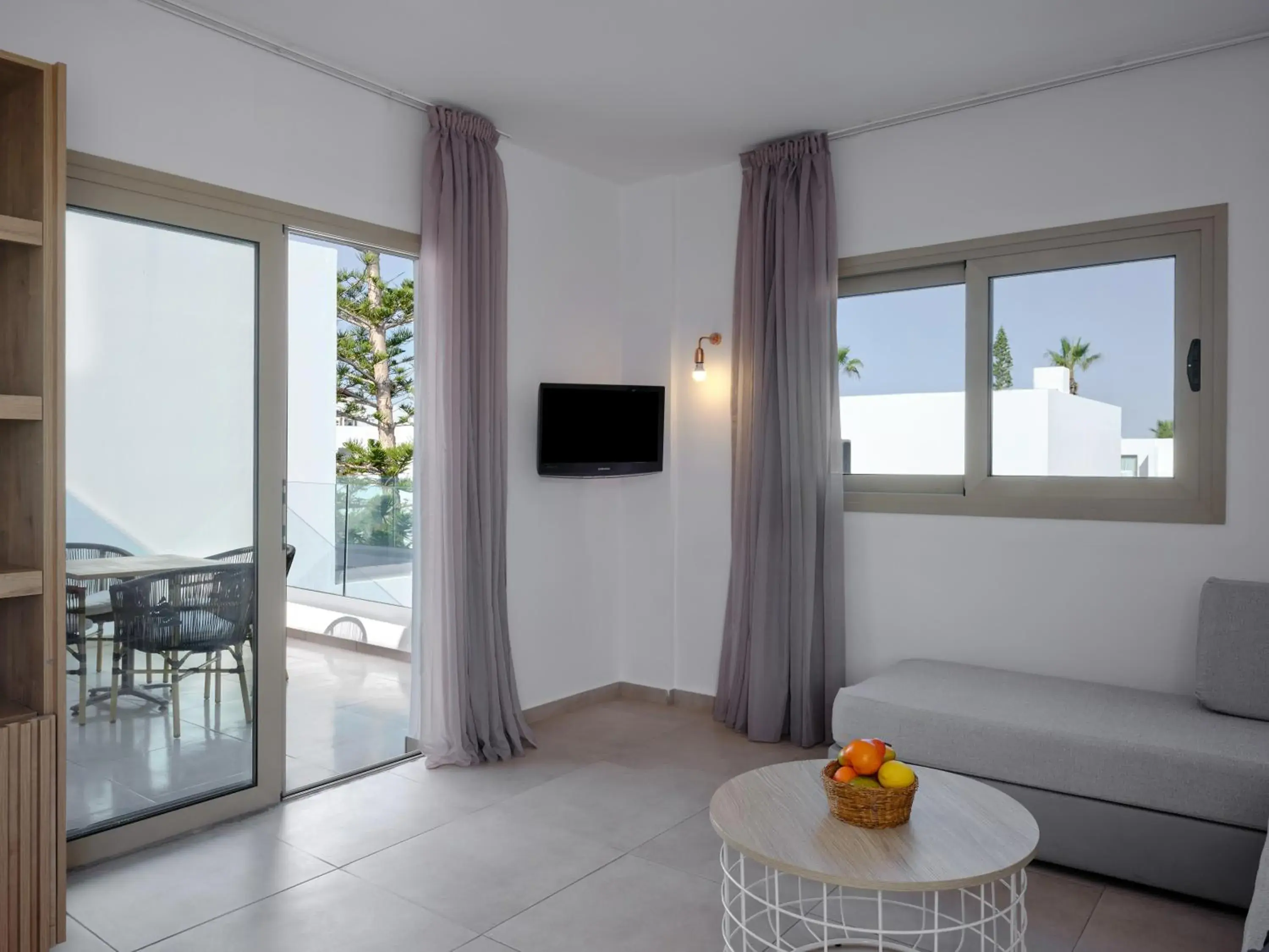Seating area, TV/Entertainment Center in Panthea Holiday Village Water Park Resort
