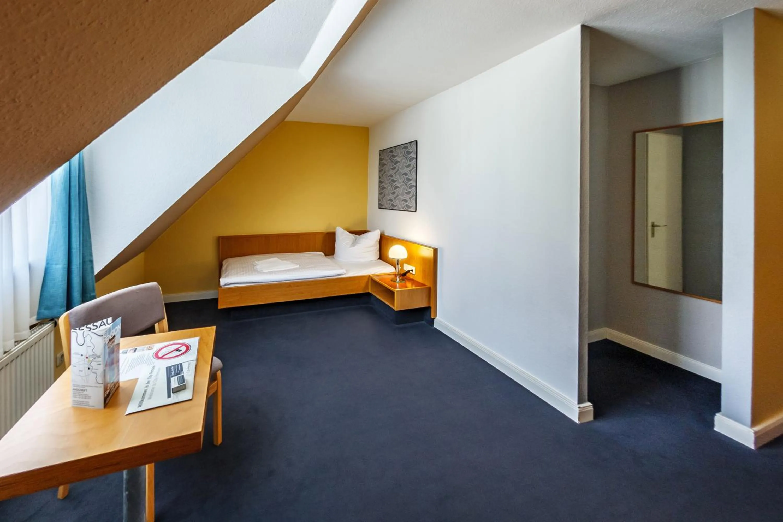 Photo of the whole room, Bed in City-Pension Dessau-Roßlau