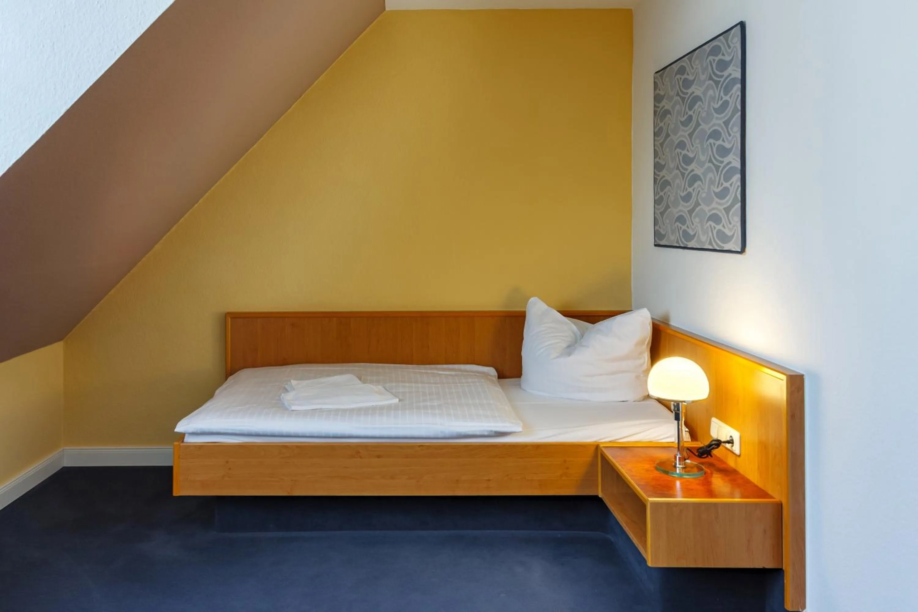 Bed in City-Pension Dessau-Roßlau