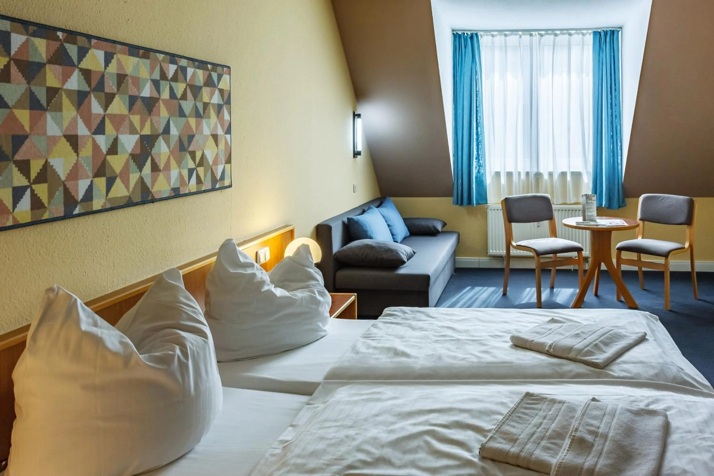 Photo of the whole room, Bed in City-Pension Dessau-Roßlau