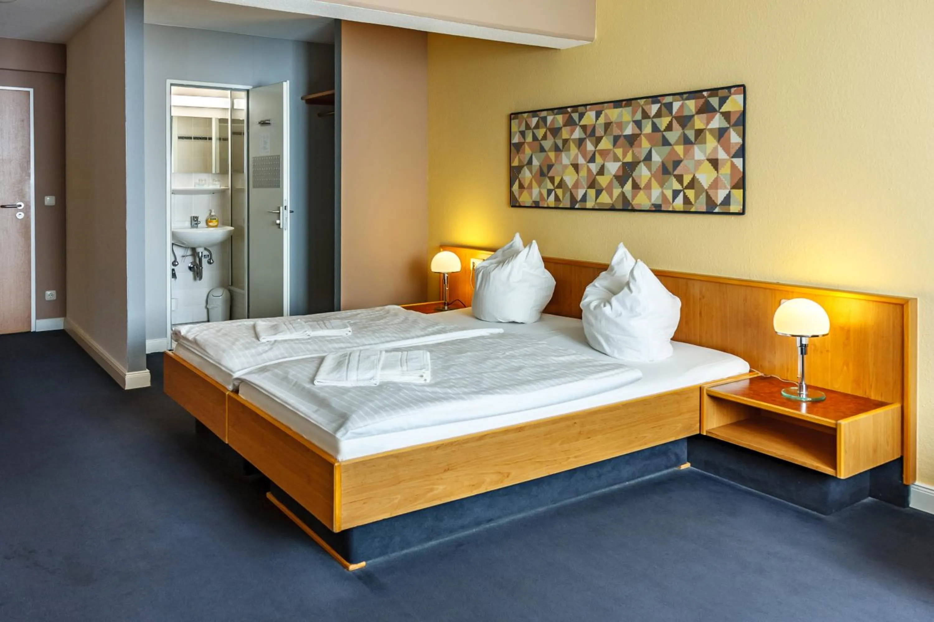 Bed in City-Pension Dessau-Roßlau