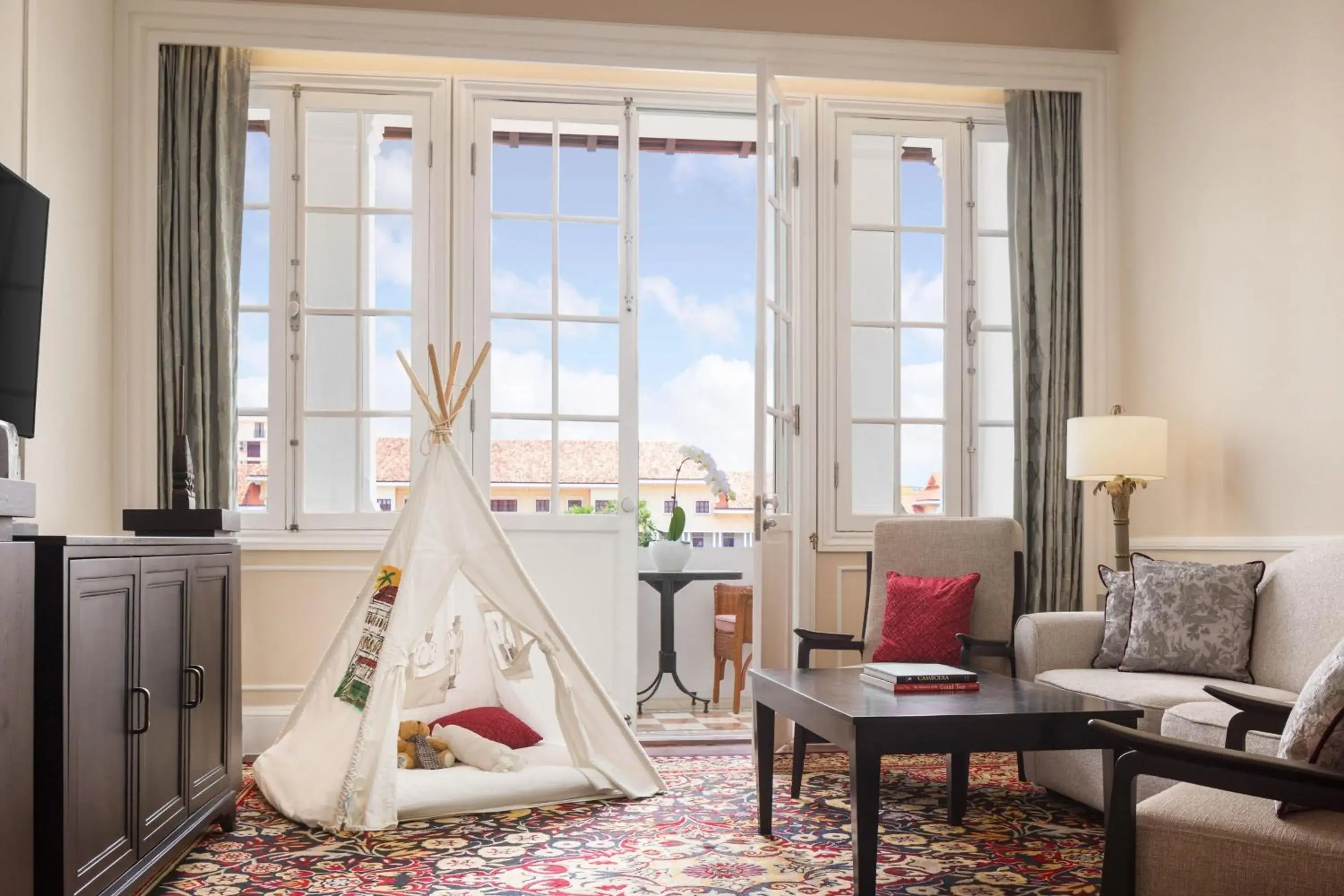 Bedroom in Raffles Hotel Le Royal Bedroom in Raffles Hotel Le Royal