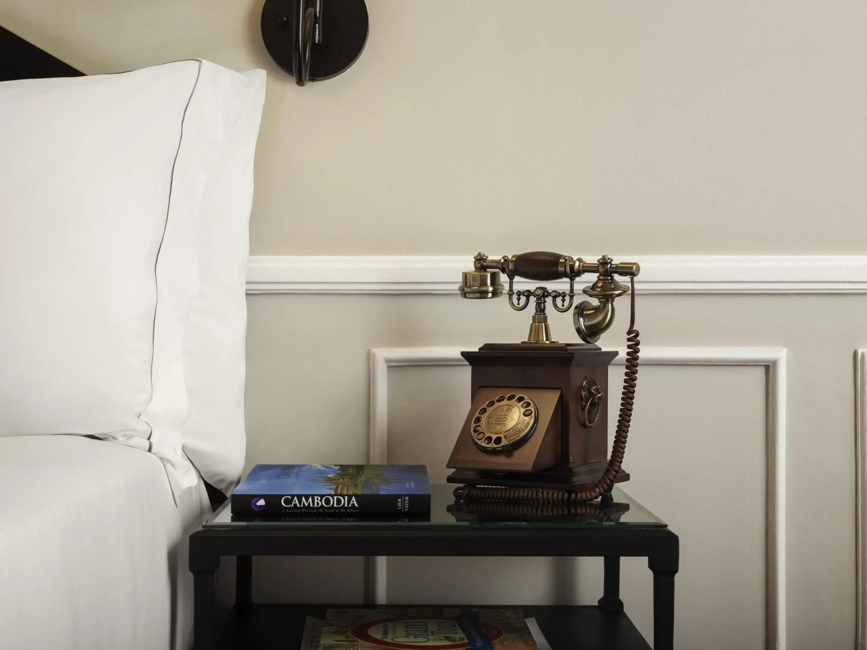 Bedroom in Raffles Hotel Le Royal Bedroom in Raffles Hotel Le Royal