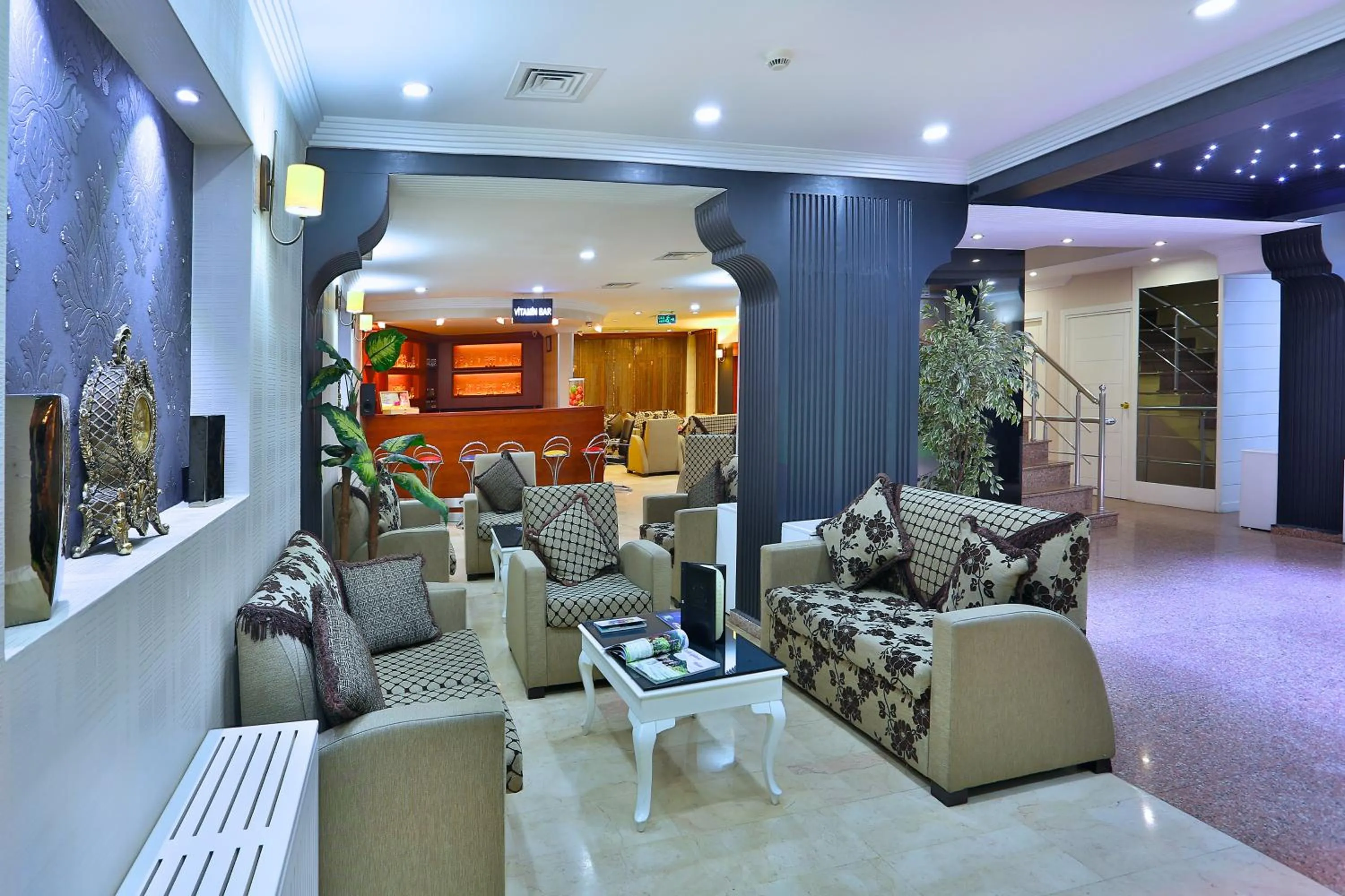 Communal lounge/ TV room in Budo Hotel