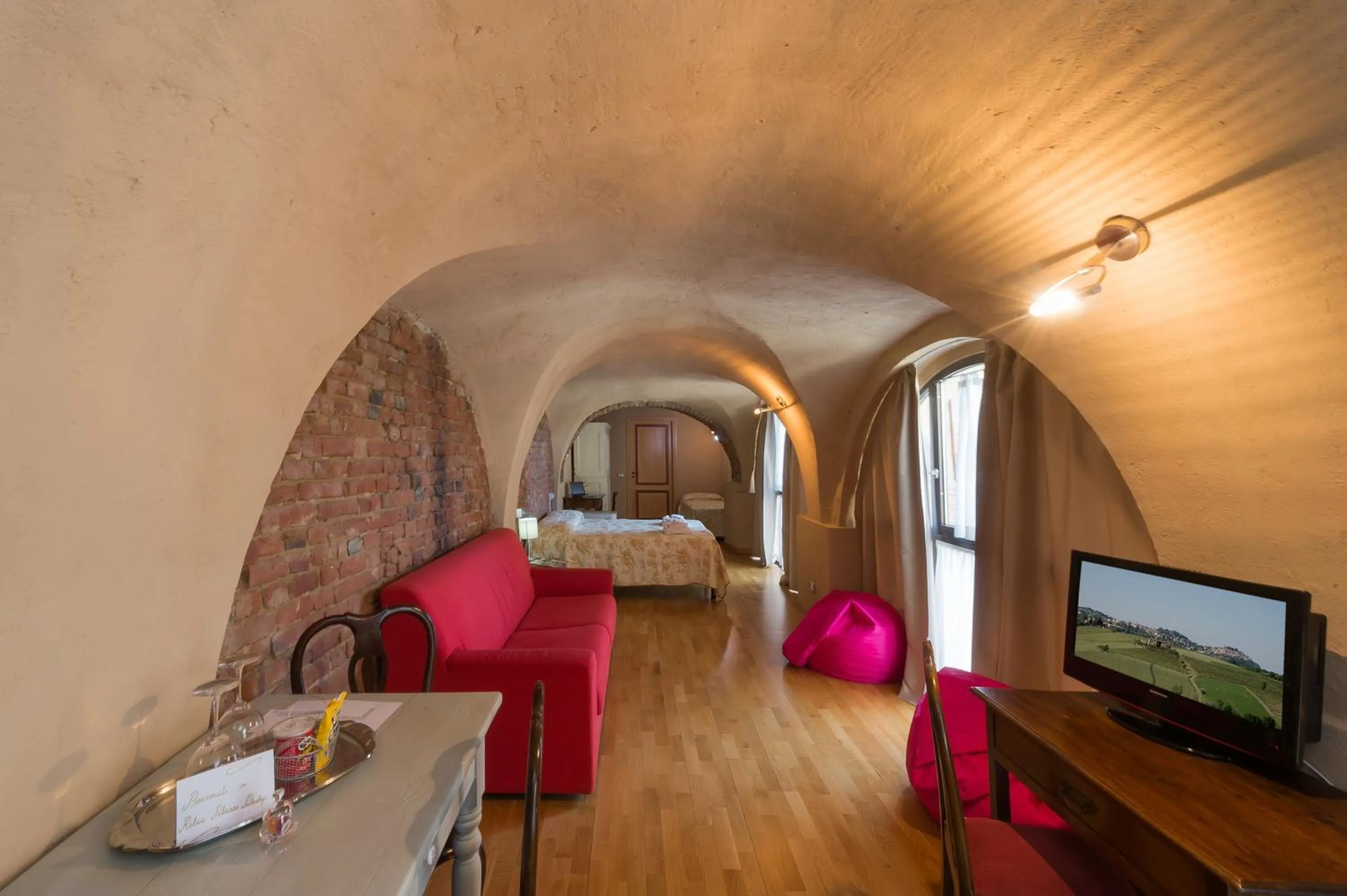 Photo of the whole room, Bed in Relais Palazzo Paleologi Sec.XIV