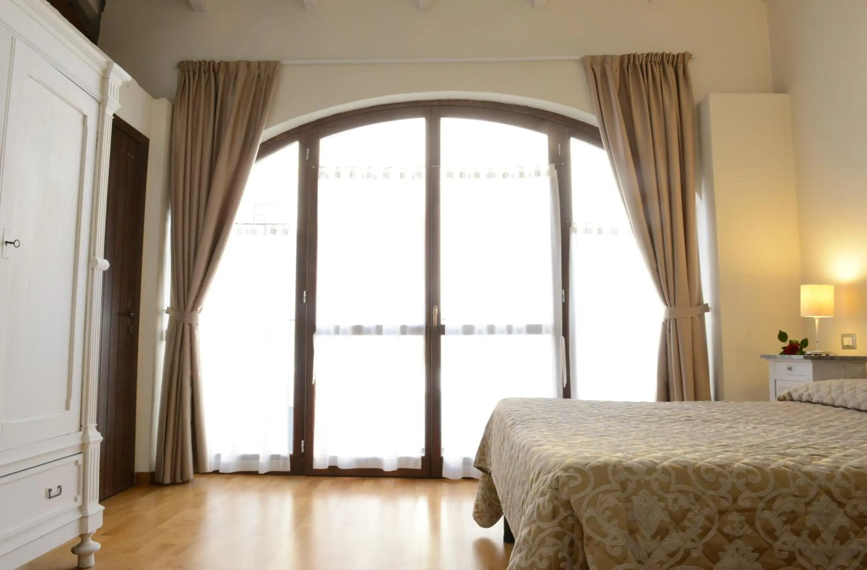 View (from property/room), Bed in Relais Palazzo Paleologi Sec.XIV View (from property/room), Bed in Relais Palazzo Paleologi Sec.XIV