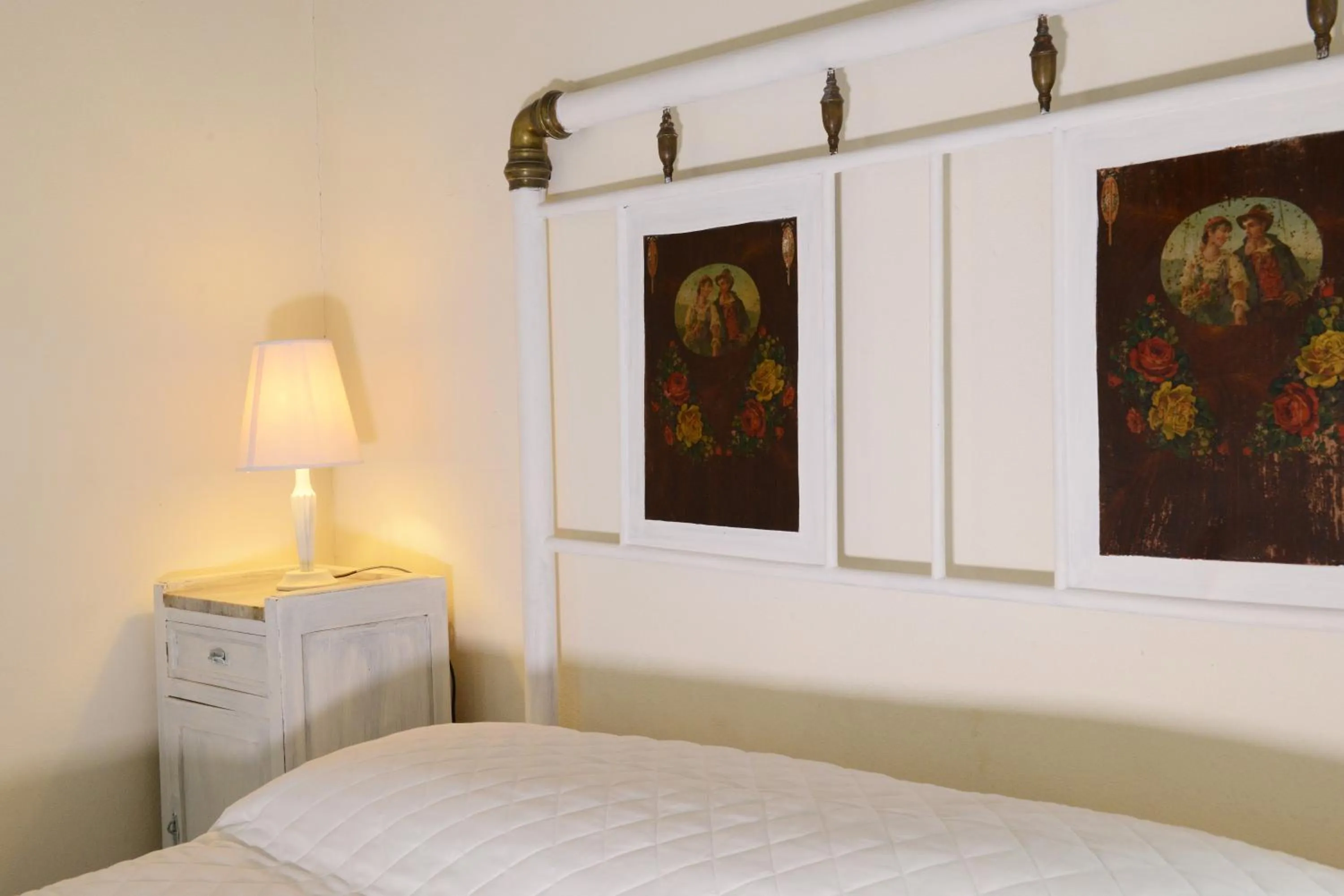 Bed in Relais Palazzo Paleologi Sec.XIV