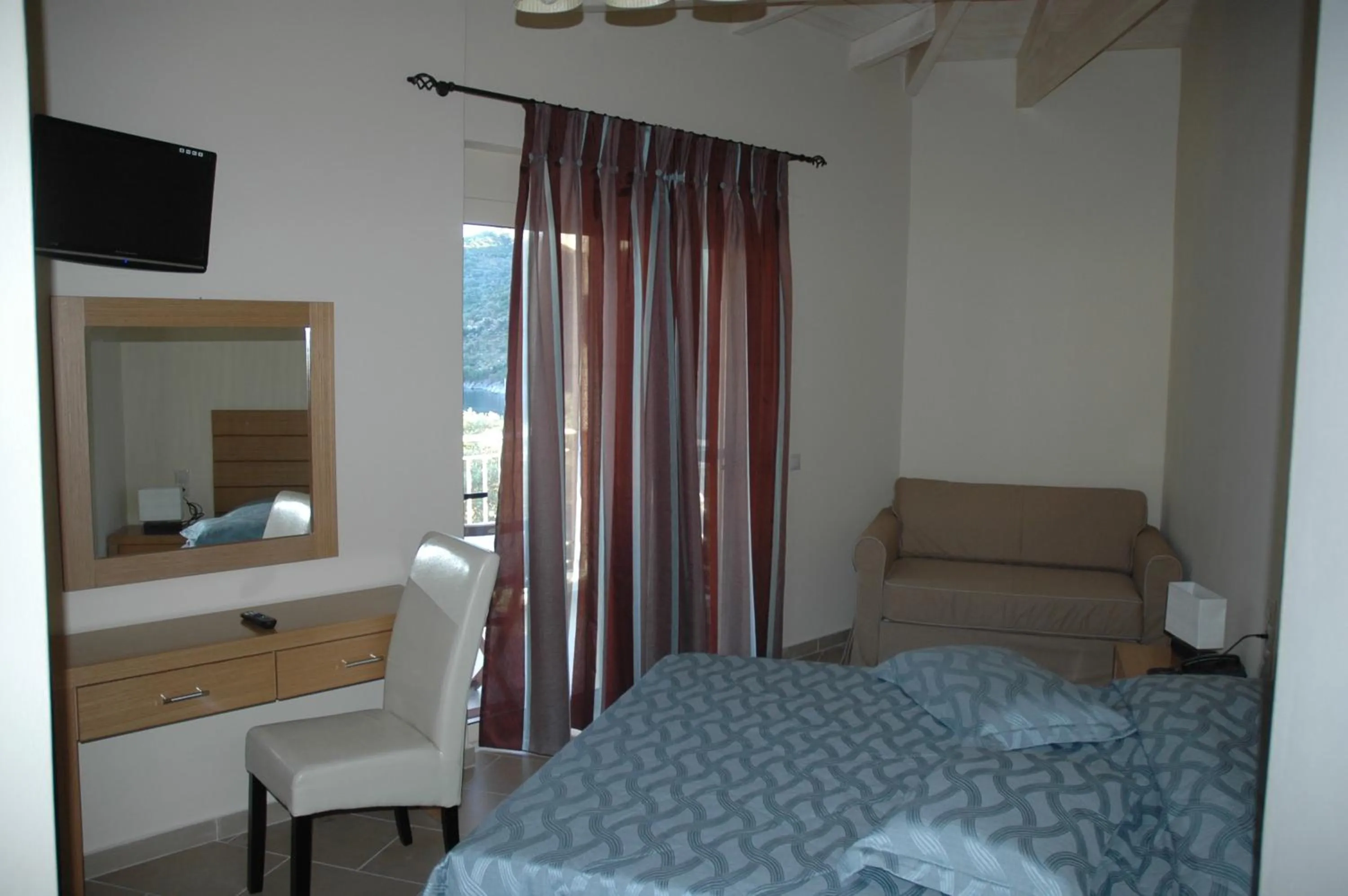 Photo of the whole room, Bed in Rouda Village