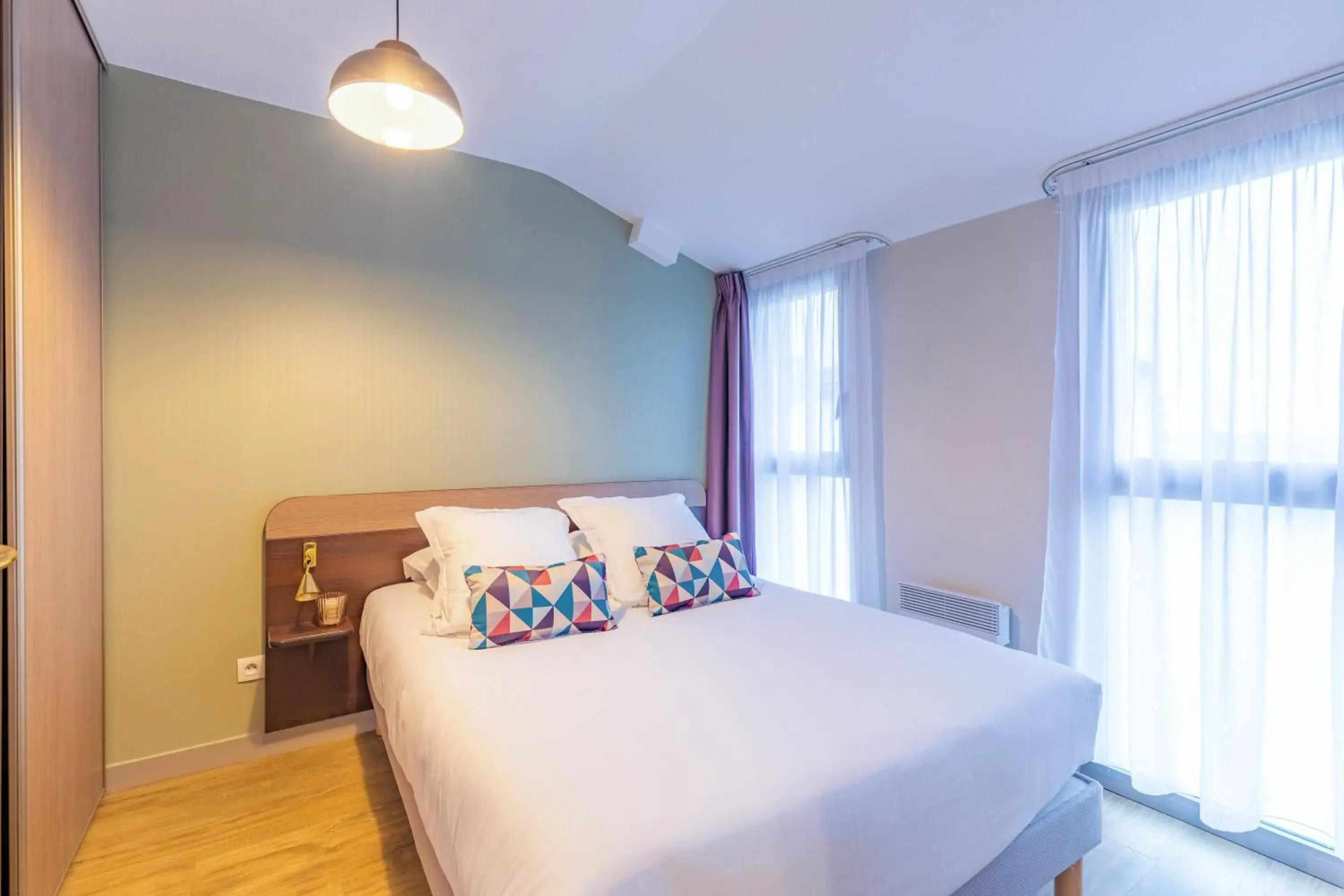 Bed in Appart'City Classic Angoulême Centre Bed in Appart'City Classic Angoulême Centre