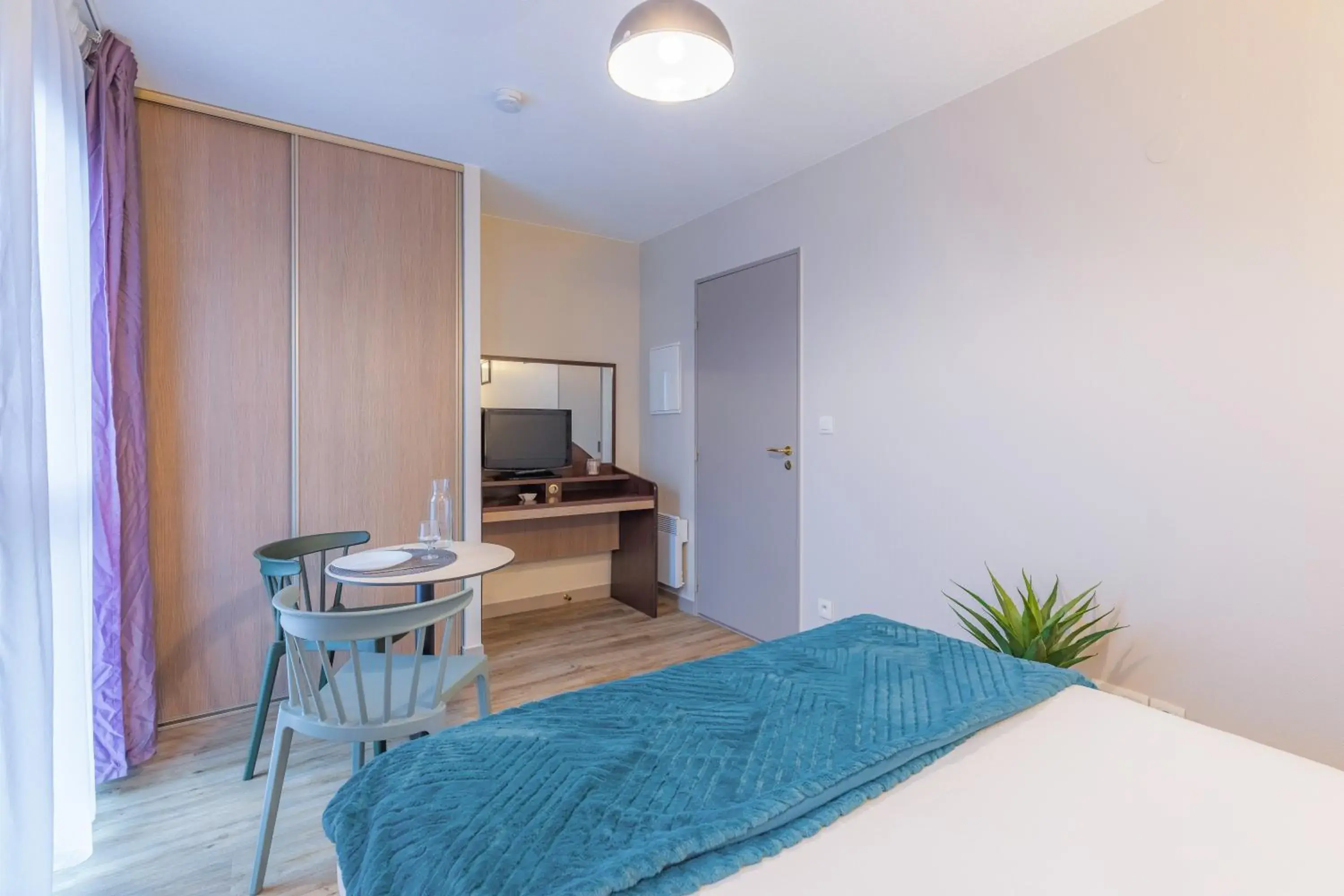 Bed in Appart'City Classic Angoulême Centre Bed in Appart'City Classic Angoulême Centre