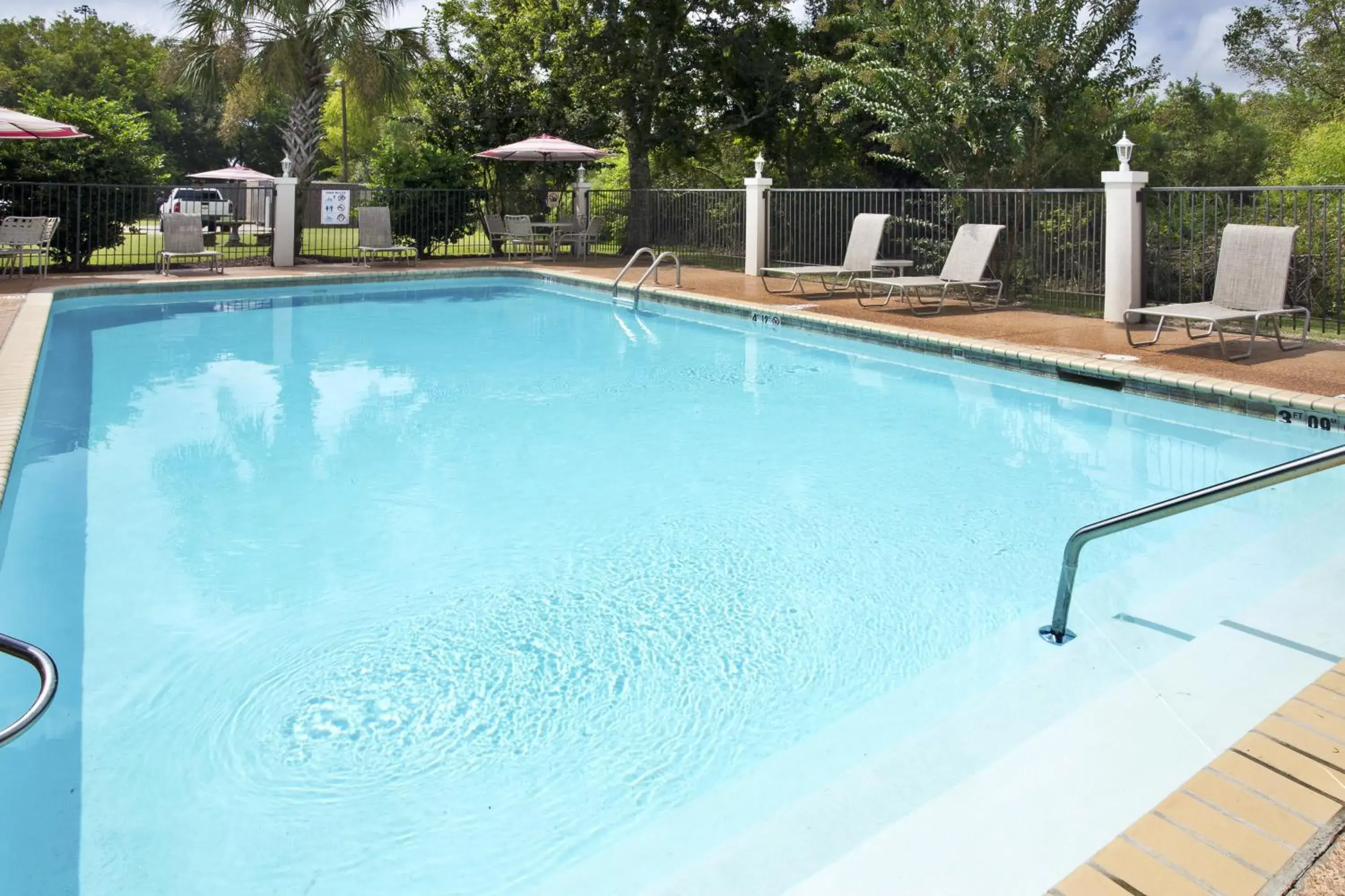 Swimming pool in Holiday Inn Express Breaux Bridge by IHG Swimming pool in Holiday Inn Express Breaux Bridge by IHG