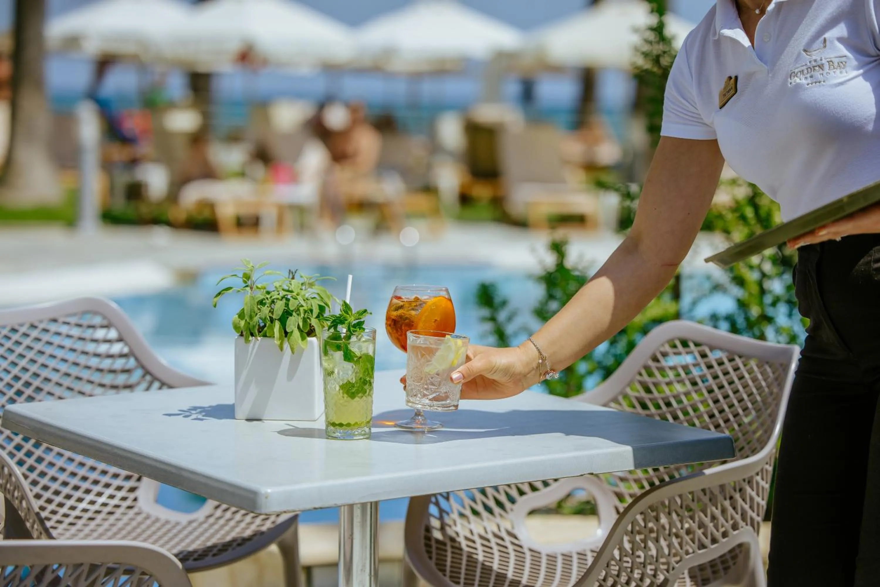 Lounge or bar in Golden Bay Beach Hotel