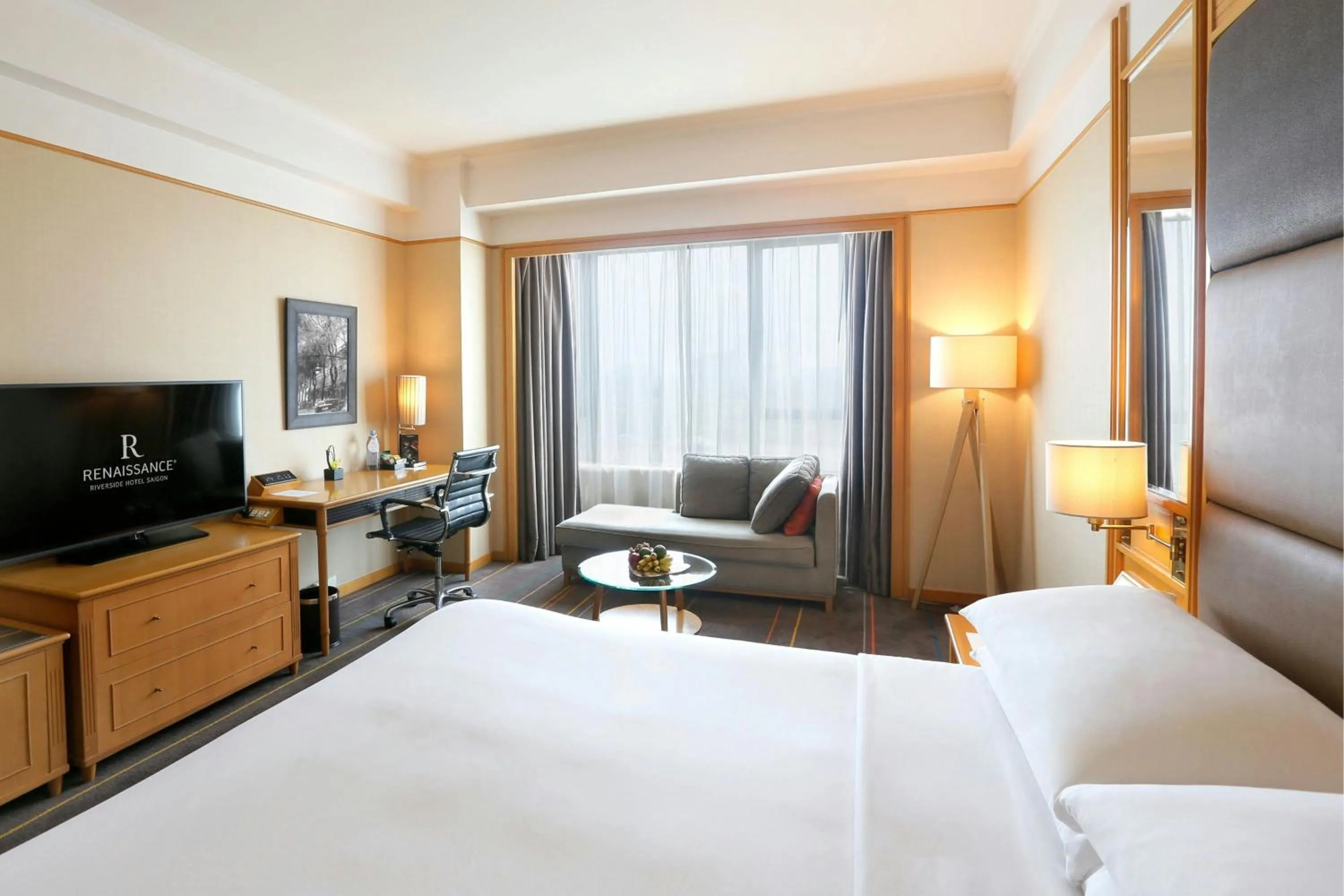 Photo of the whole room, Bed in Renaissance Riverside Hotel Saigon