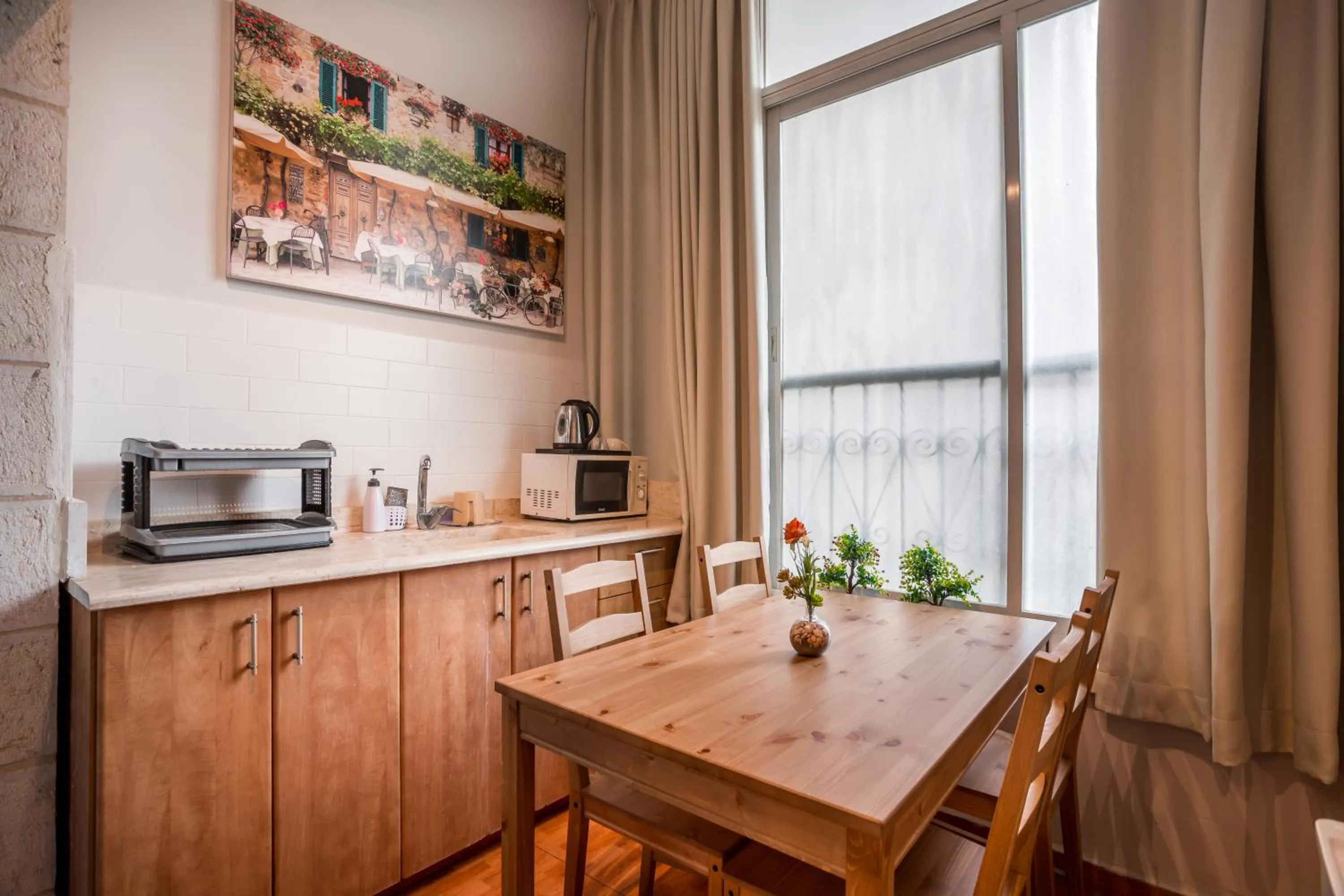 Kitchen or kitchenette in Avital Hotel