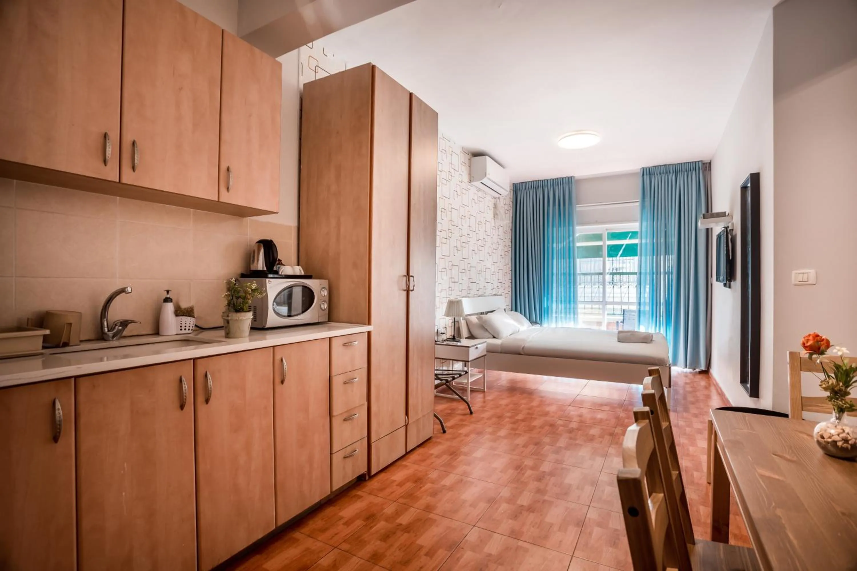 Kitchen or kitchenette, Bed in Avital Hotel