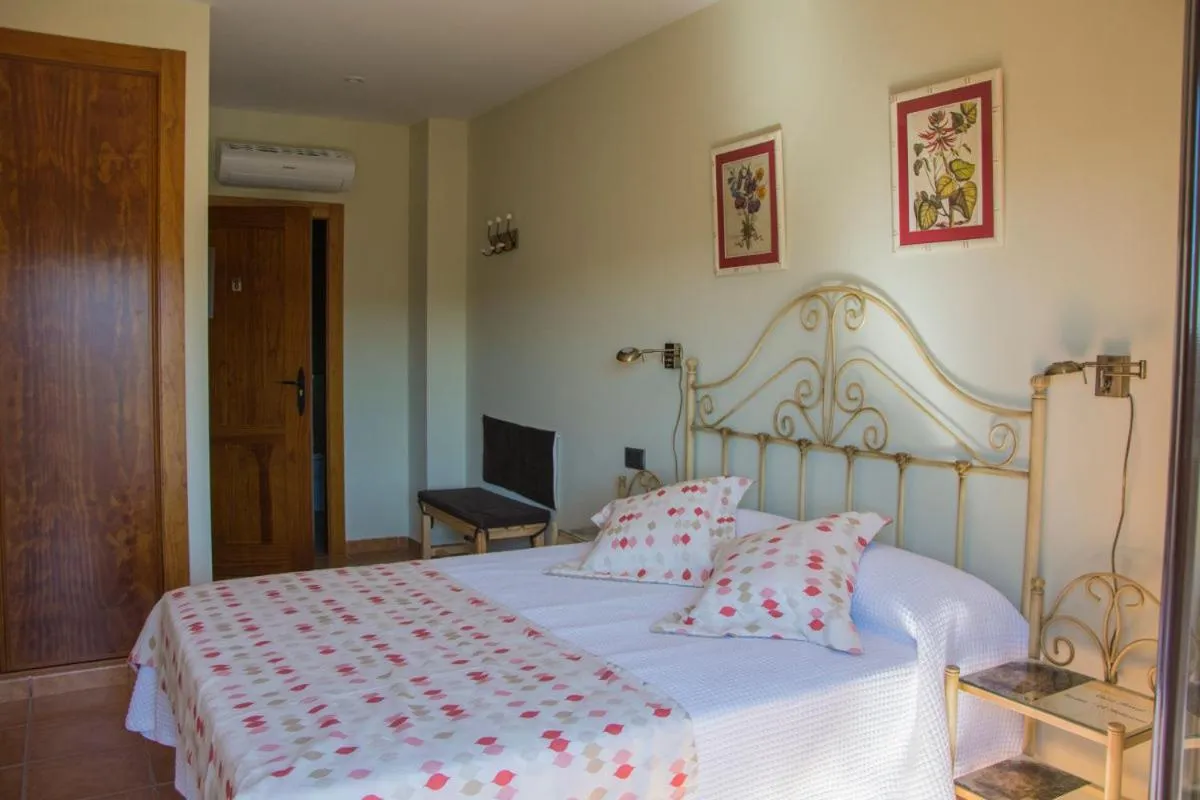 Bed in Casa Rural Fuente El Boticario