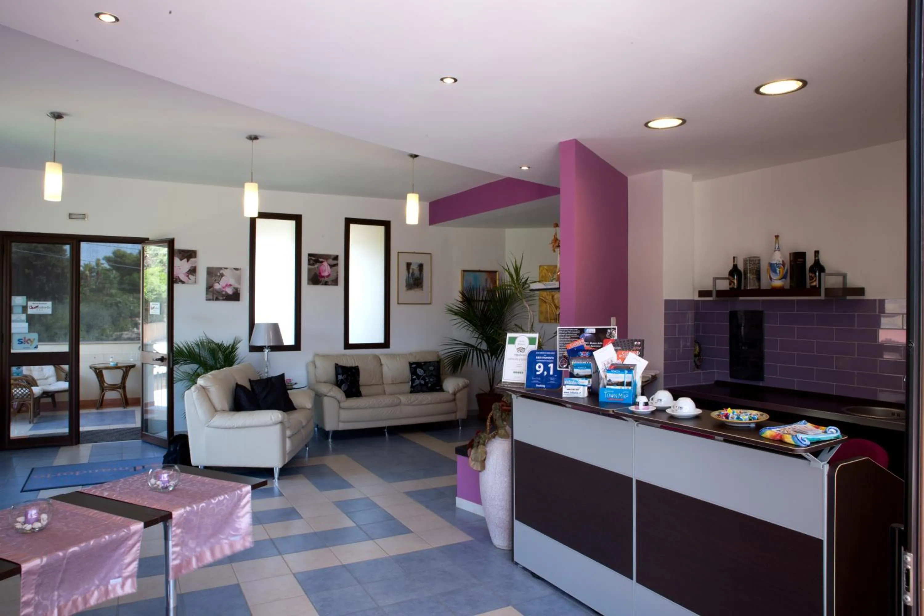 Communal lounge/ TV room in B&B Il Mandorlo