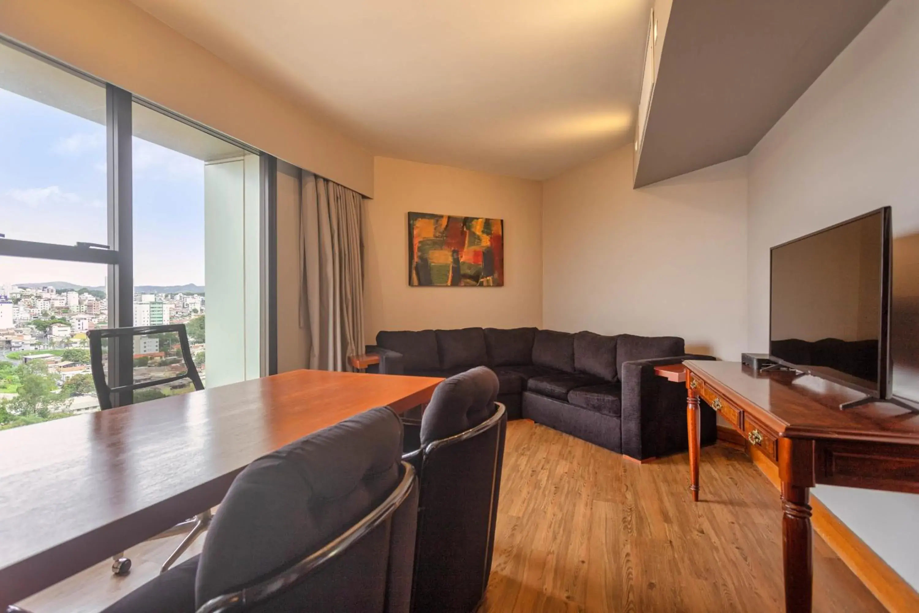 Living room in Ouro Minas Hotel Belo Horizonte, Dolce by Wyndham Living room in Ouro Minas Hotel Belo Horizonte, Dolce by Wyndham