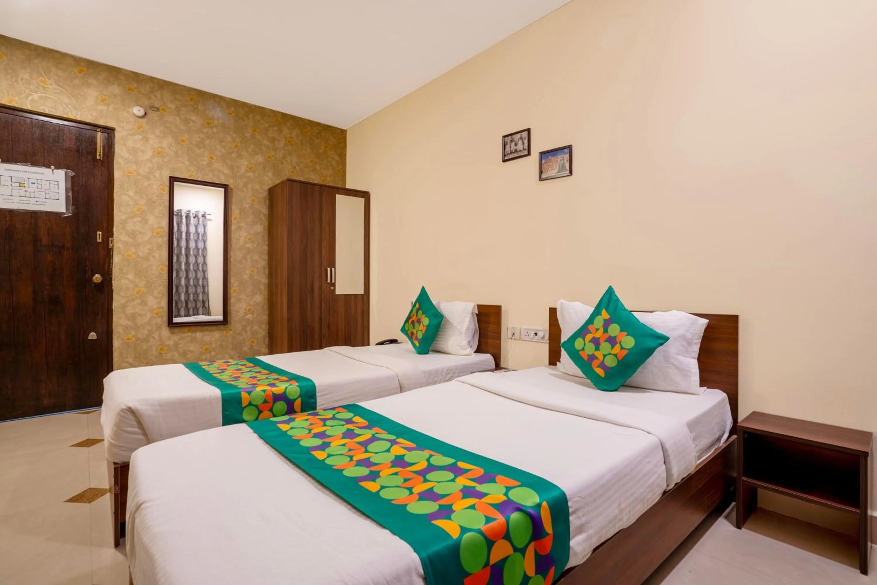 Bedroom, Bed in Treebo Srico, Banjara Hills