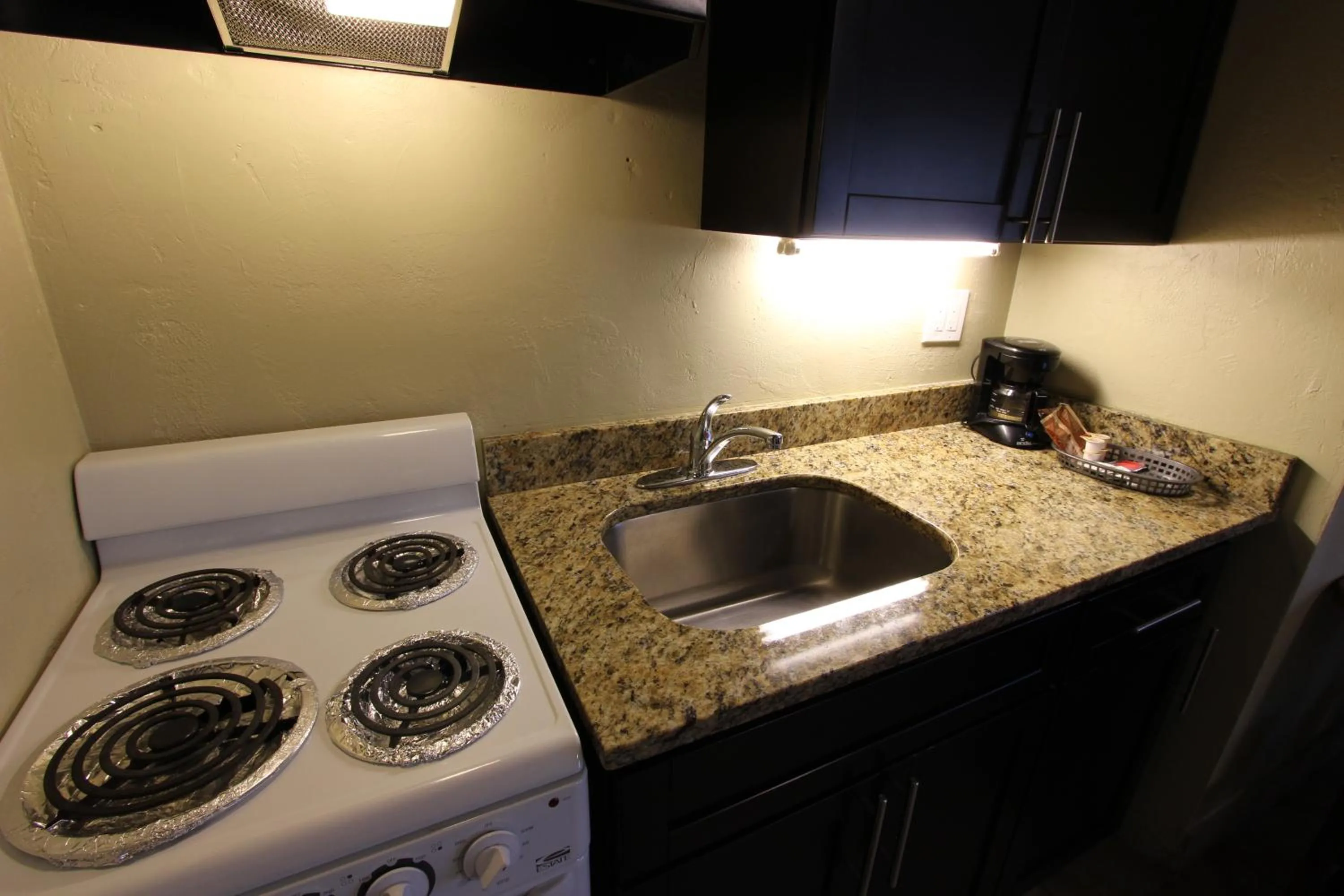 Kitchen or kitchenette in Oceans Beach Resort & Suites