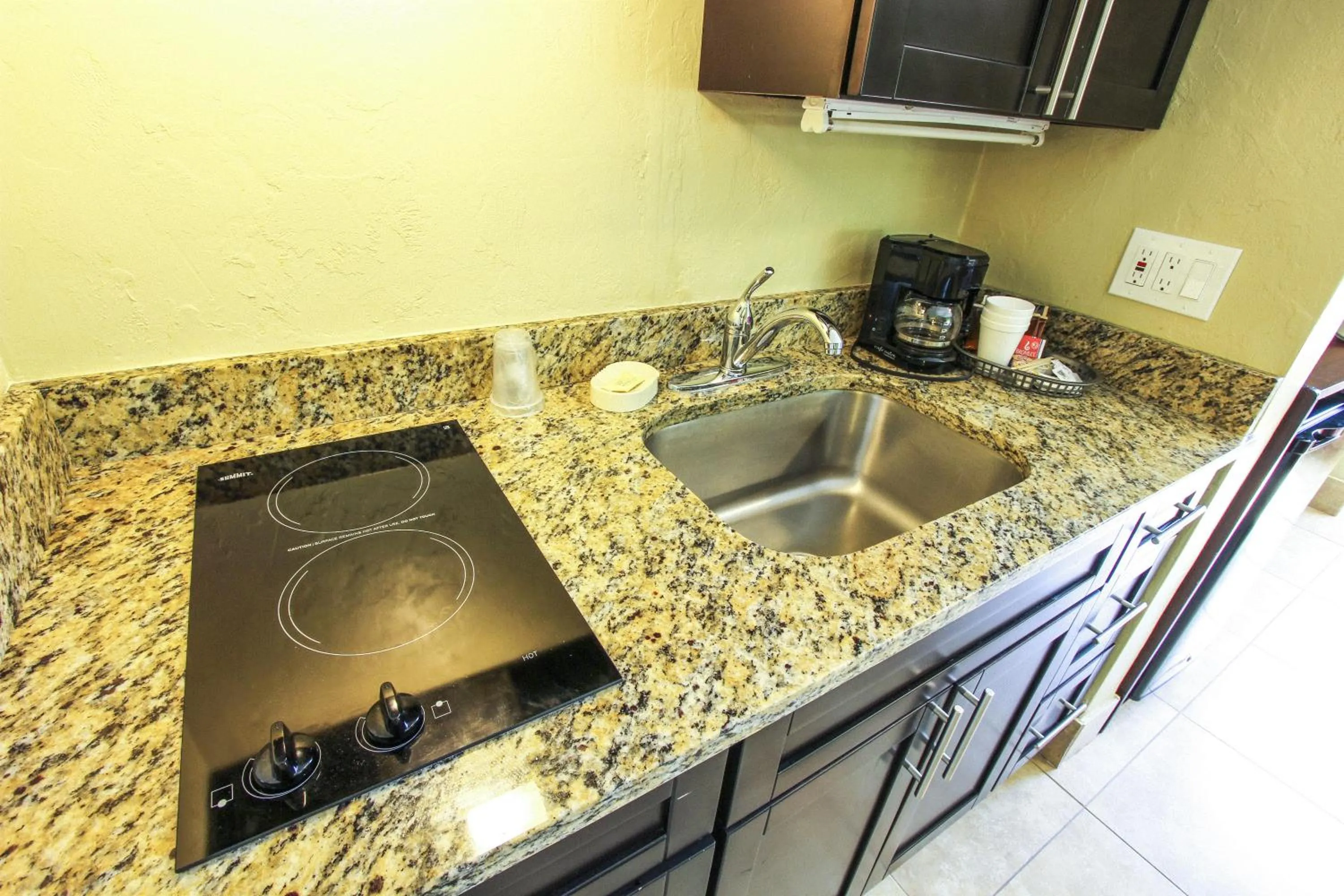 Kitchen or kitchenette in Oceans Beach Resort & Suites
