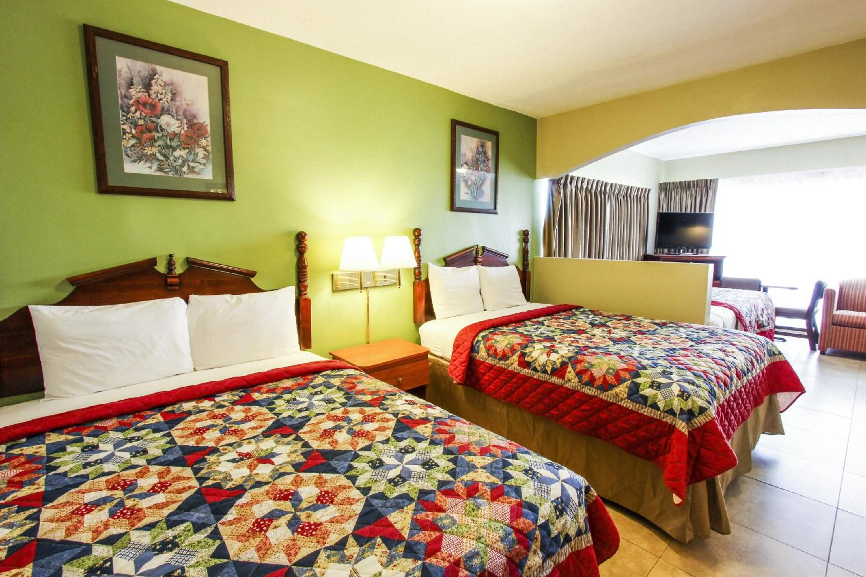 Bedroom, Bed in Oceans Beach Resort & Suites