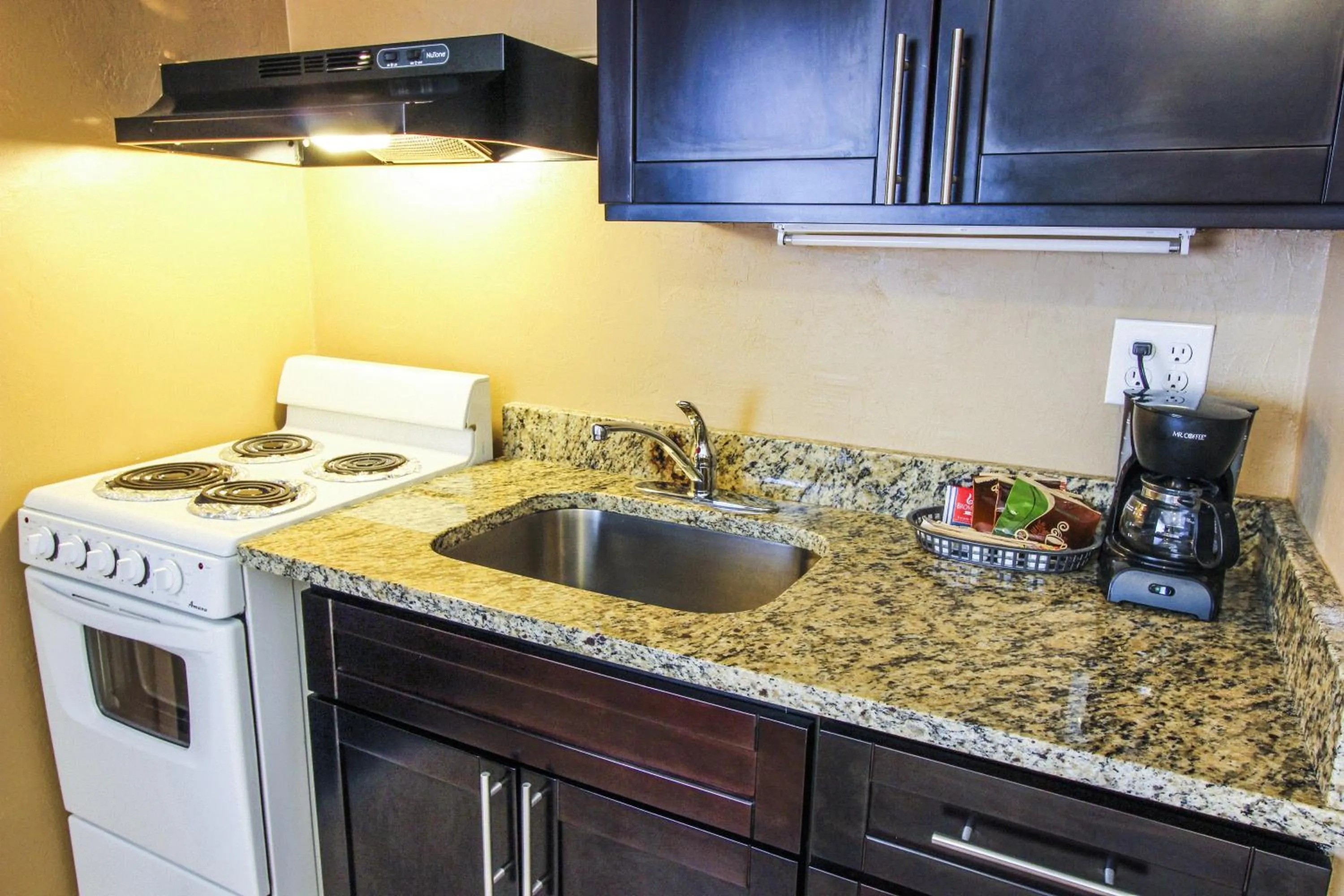Kitchen or kitchenette in Oceans Beach Resort & Suites