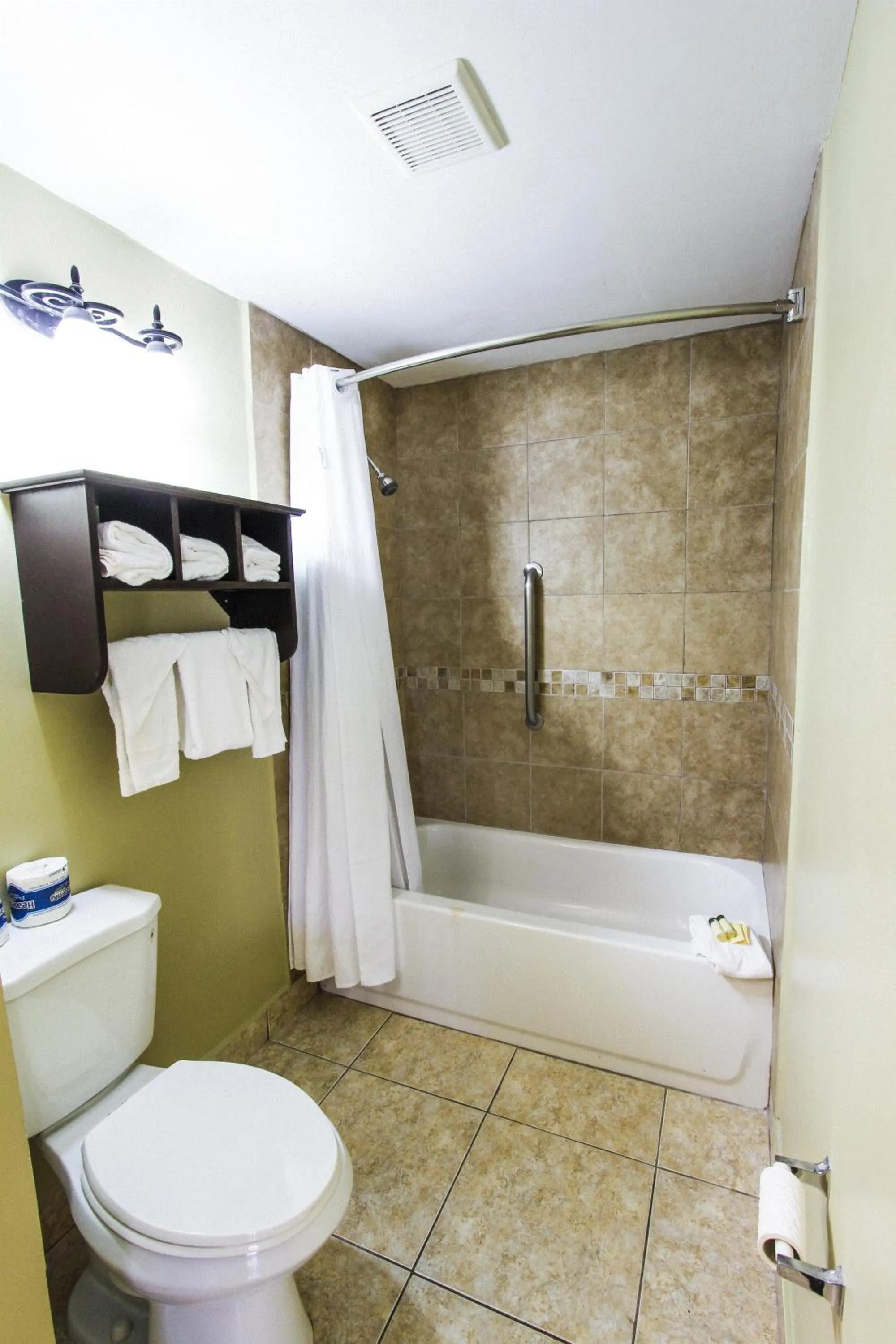Bathroom in Oceans Beach Resort & Suites